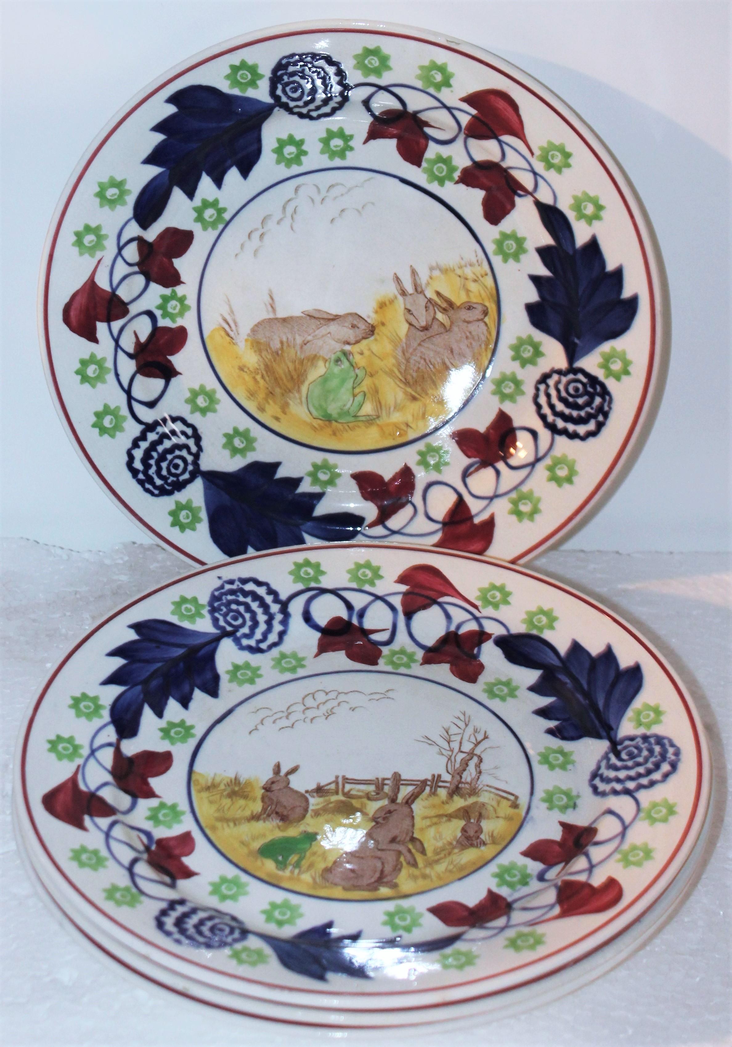 These wonderful 19th century hand painted rabbit plates are in pristine condition. Its very hard to find sets of four of the rabbit and frog stick spatter plates.