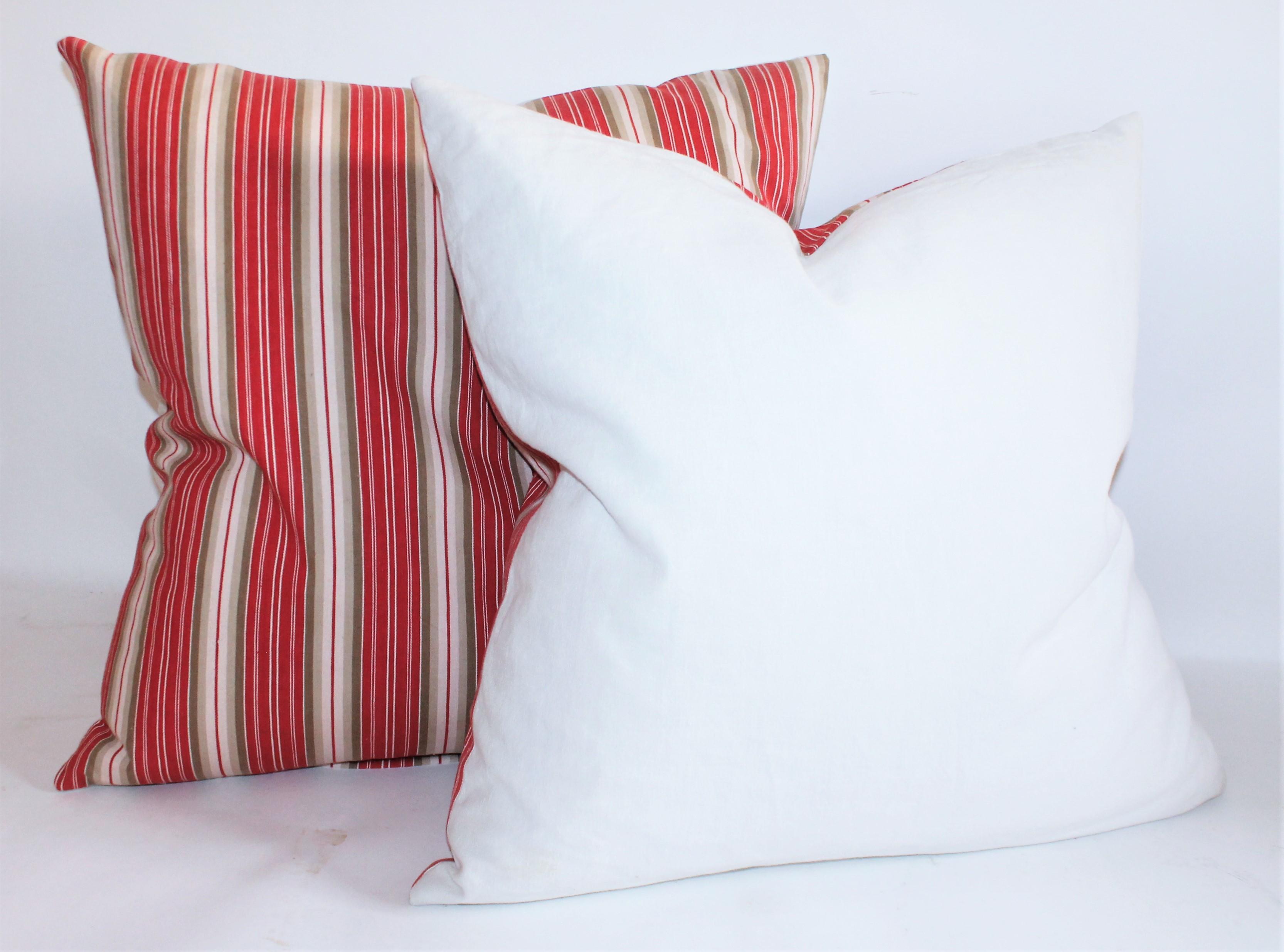 red and cream striped cushions