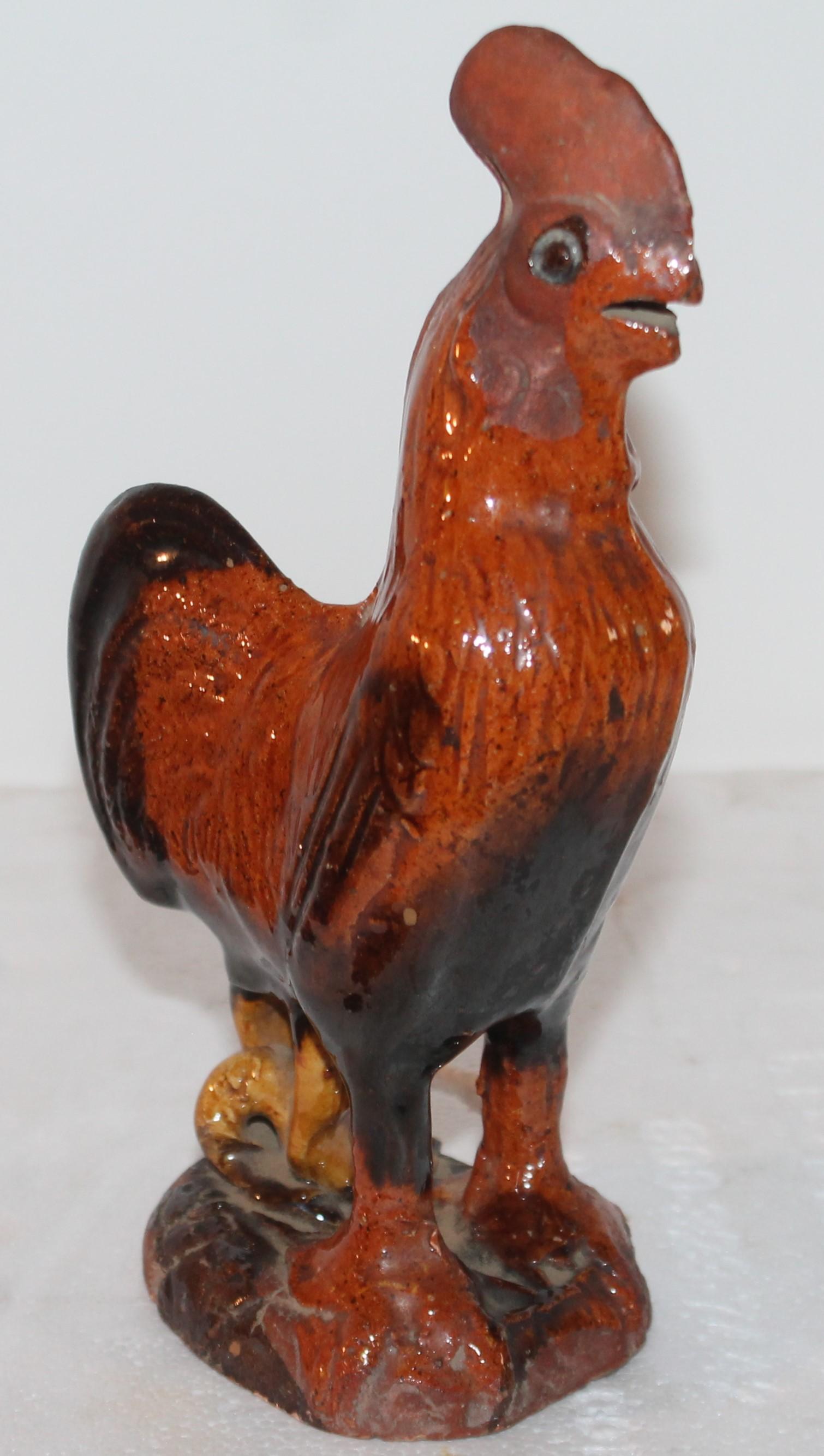 19th century Pennsylvania red ware pottery rooster found in Berks County, Pennsylvania. This rooster is in fine condition.