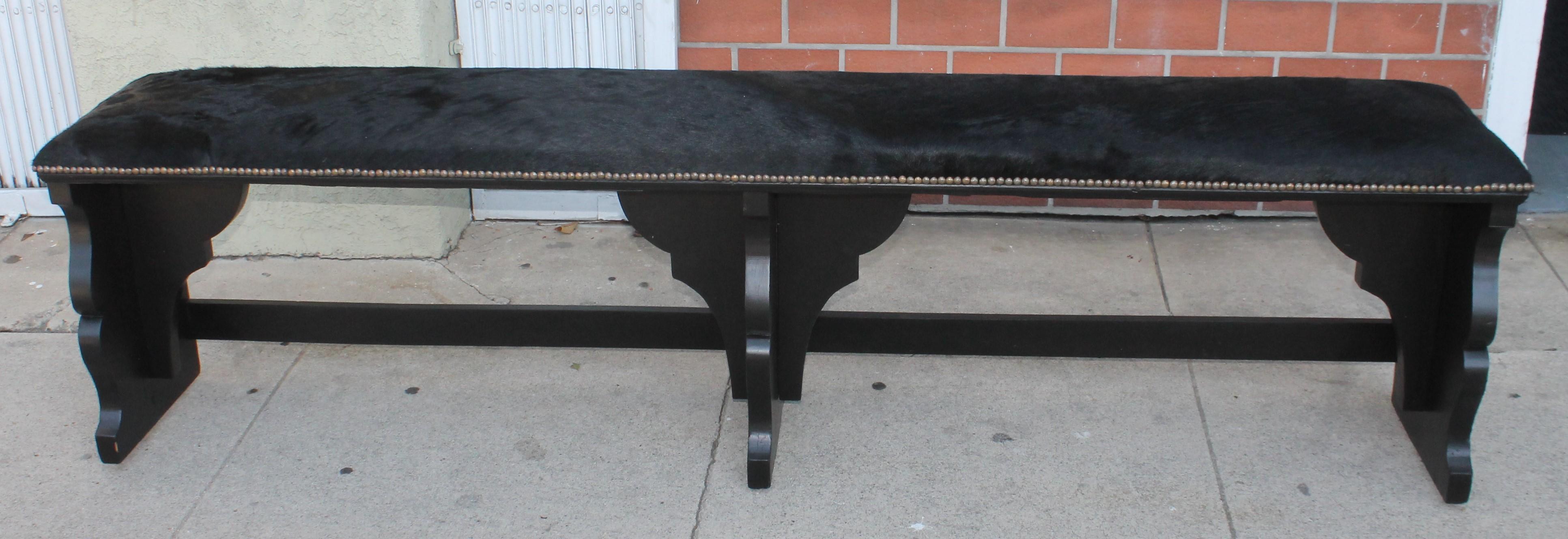 Late 19th Century  Pair of 19th Century Rustic Black Painted Cowhide Benches