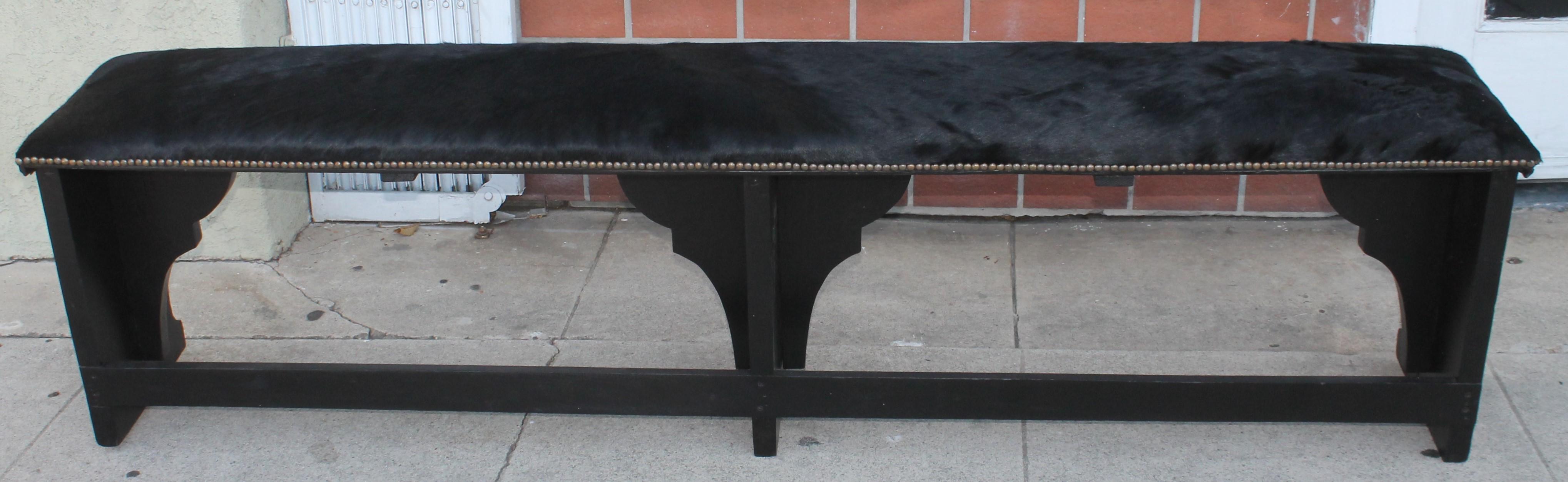 American  Pair of 19th Century Rustic Black Painted Cowhide Benches