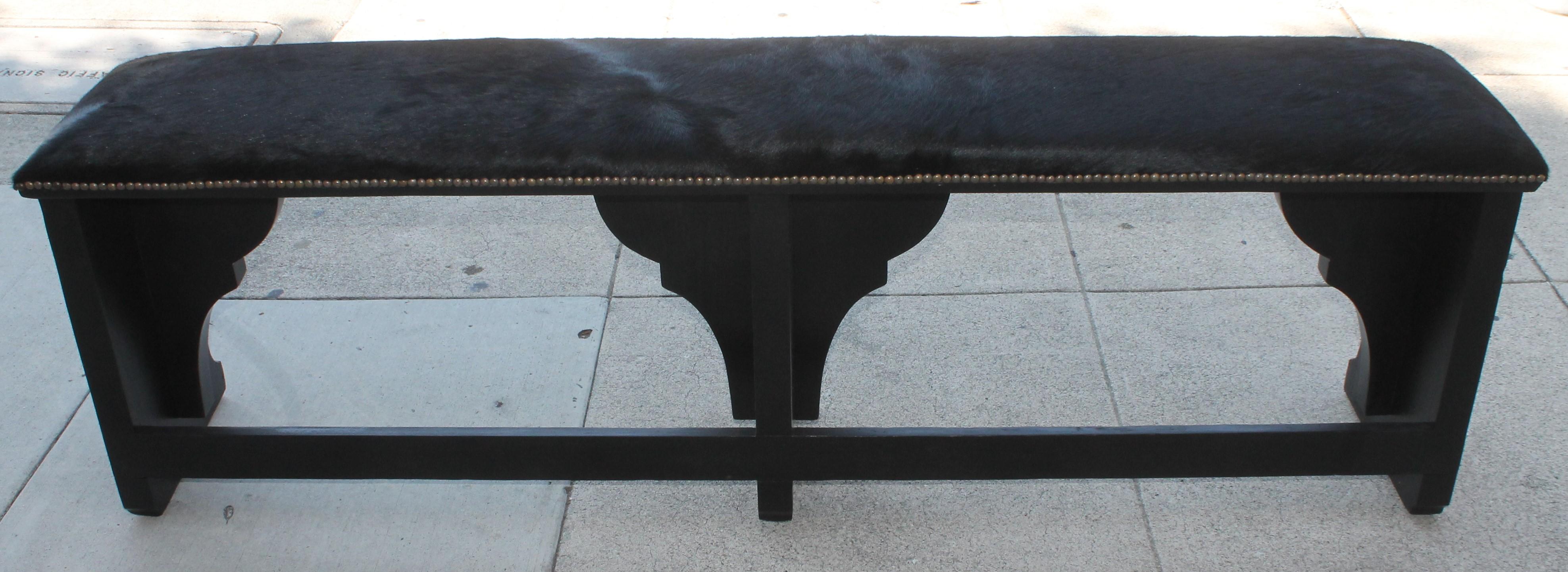 Hand-Crafted  Pair of 19th Century Rustic Black Painted Cowhide Benches