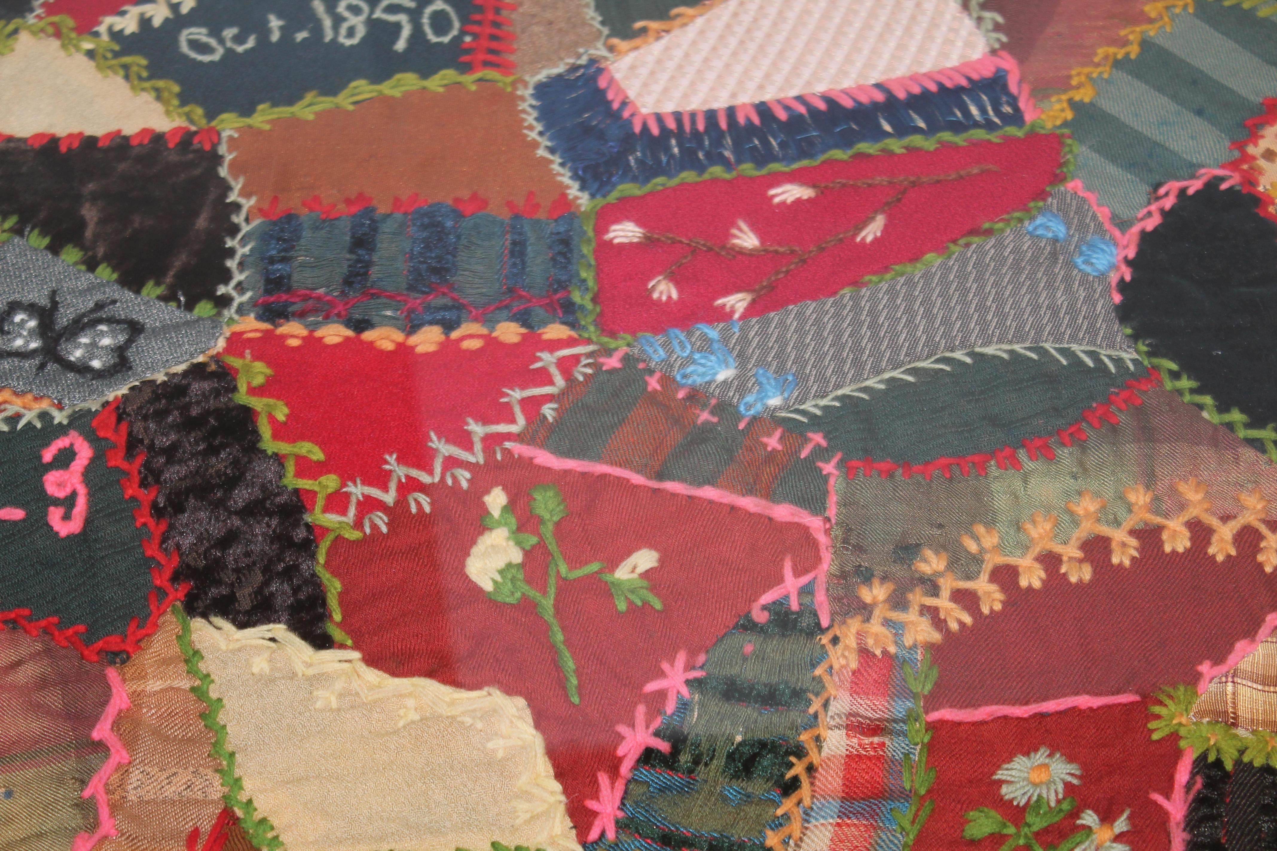 19thc velvet crazy quilt dated 1890 from Pennsylvania in pristine condition. This fine pictorial & embroidered crib quilt is quite the collectors quilt.