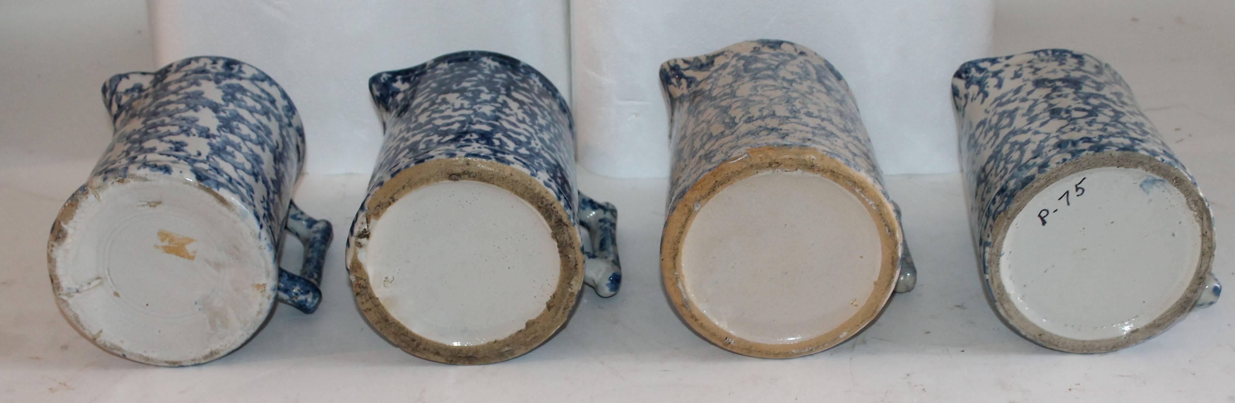 Hand-Crafted 19th Century Sponge Ware Collection of Eight Pottery Pitchers