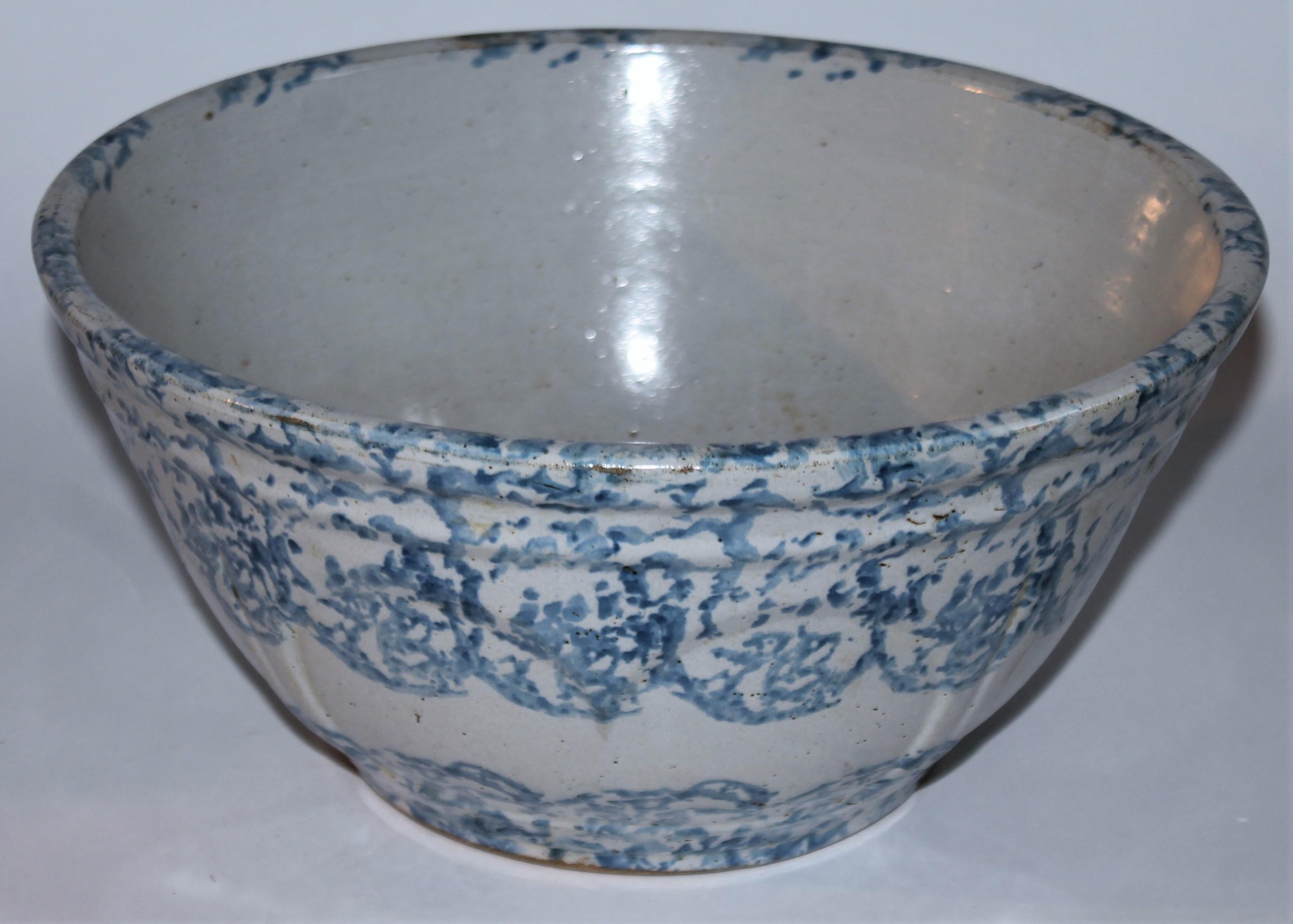 This fine large 19thc sponge ware pottery mixing or serving bowl is in fine condition. Its a nice lighter or sky blue color. Great for serving salads or fruit salad at the dinner table.