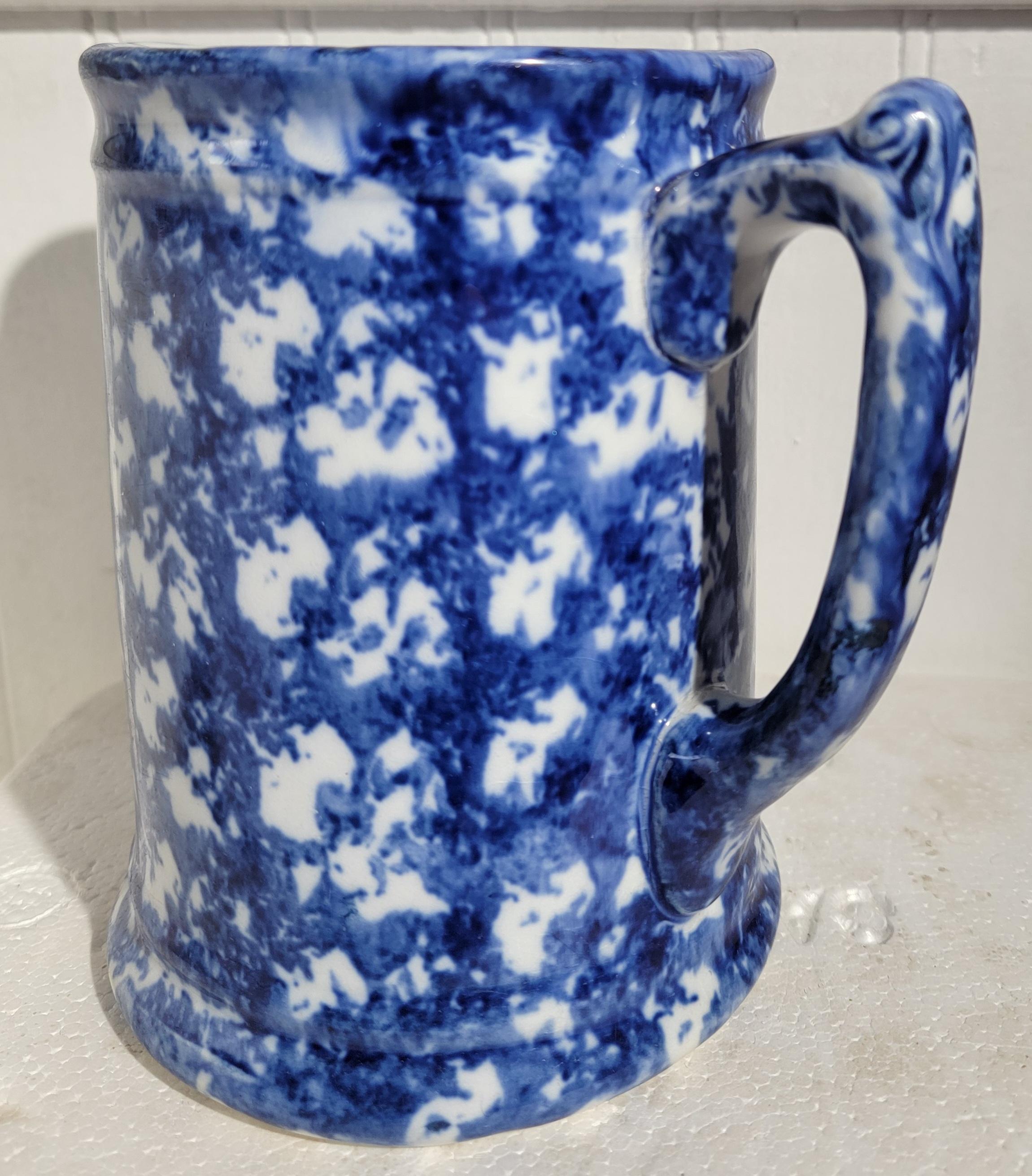 Wonderful smaller sponge ware pitcher with a wonderful sharp turn handle. The sponge blue color is a deep blue providing a great deep look. Great piece. Minor wear from age and us. 