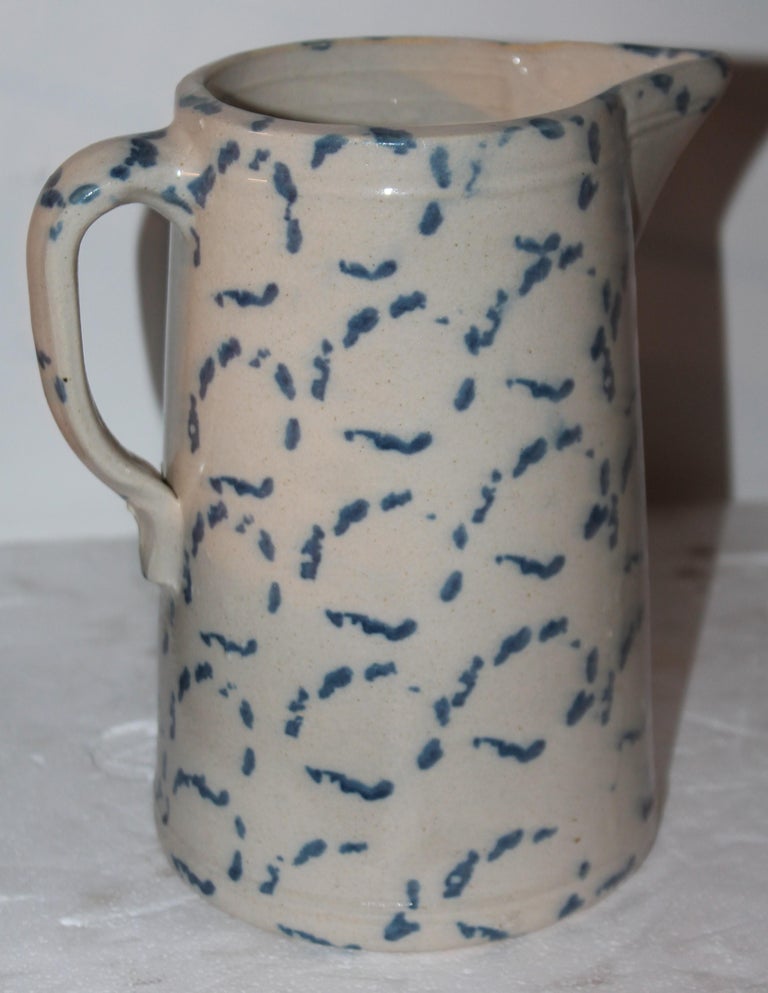19Thc design sponge ware pottery pitcher. The condition is very good and most unusual.