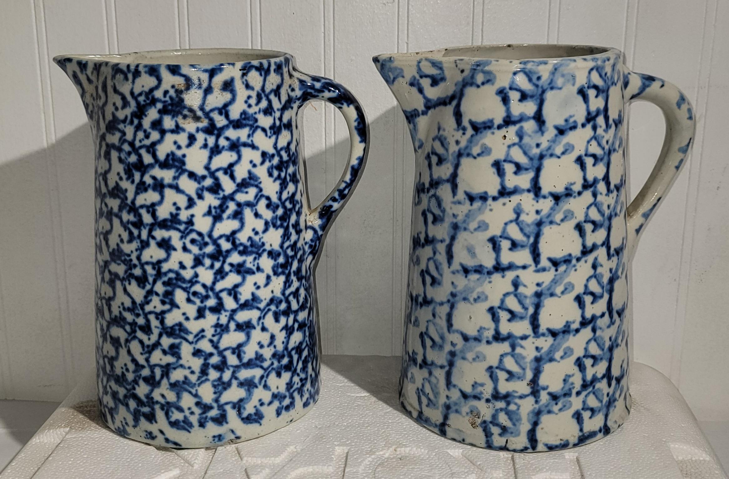 These amazing 19thc blue & white sponge ware pottery pitchers are all in fine condition.The set of four are all  different patterns and shades of blues.