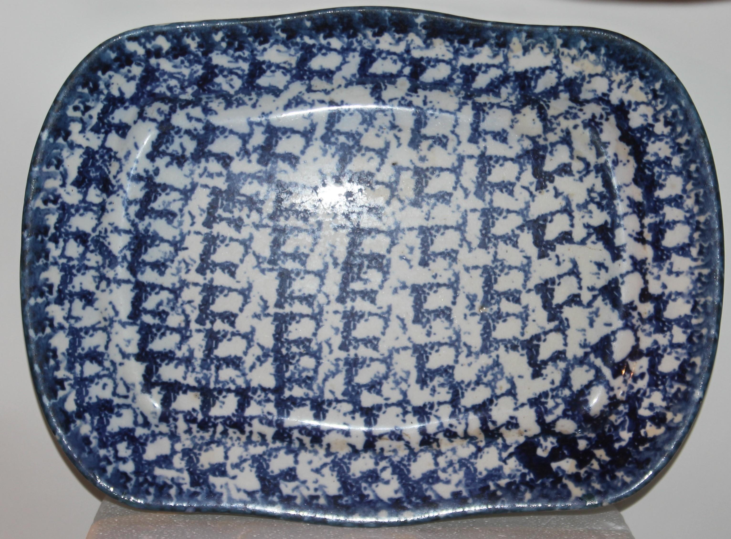 19thc Design Sponge ware serving platter in pristine. This has a nice pattern and shape.