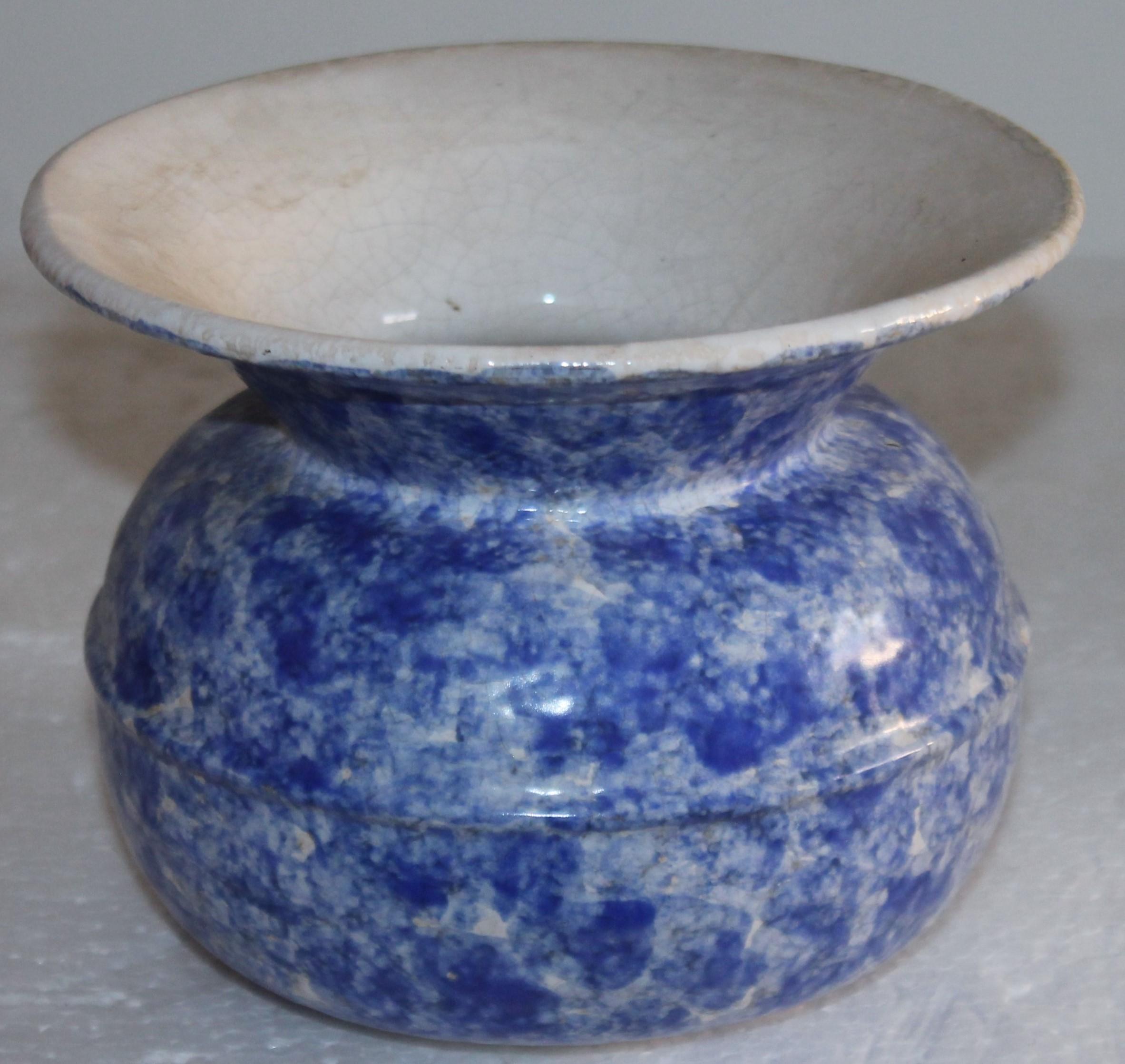 This most unusual sponge ware spittoon has such a unusual shape and form. Very early form.