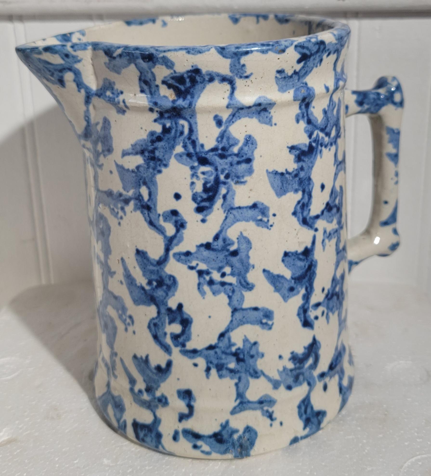 Wonderful smaller sponge ware pitcher with a wonderful squared off  handle. The sponge blue color is a beautiful light blue providing a great deep look. Great piece. Minor wear from age and us. 