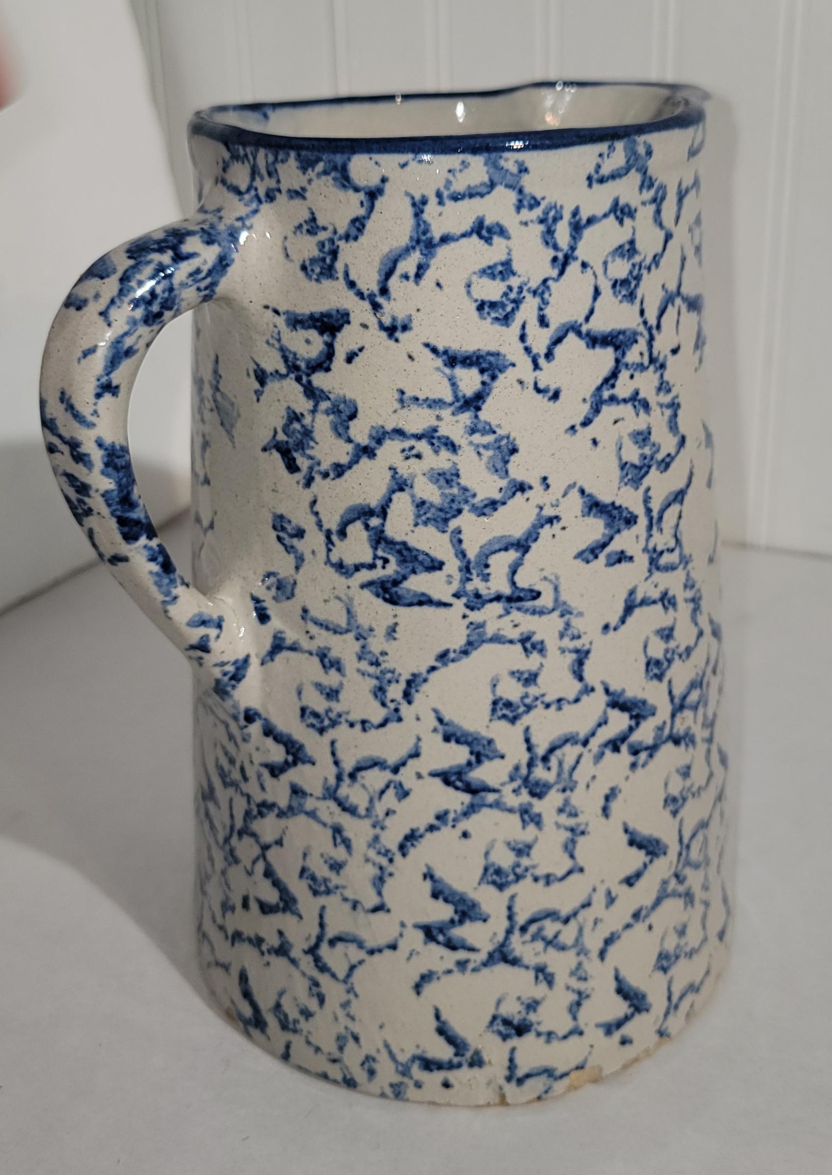 19thc sponge ware pitcher with beautiful sponge design. Very light in color. Thin blue sponge design that shows a beautiful contrast in color. 