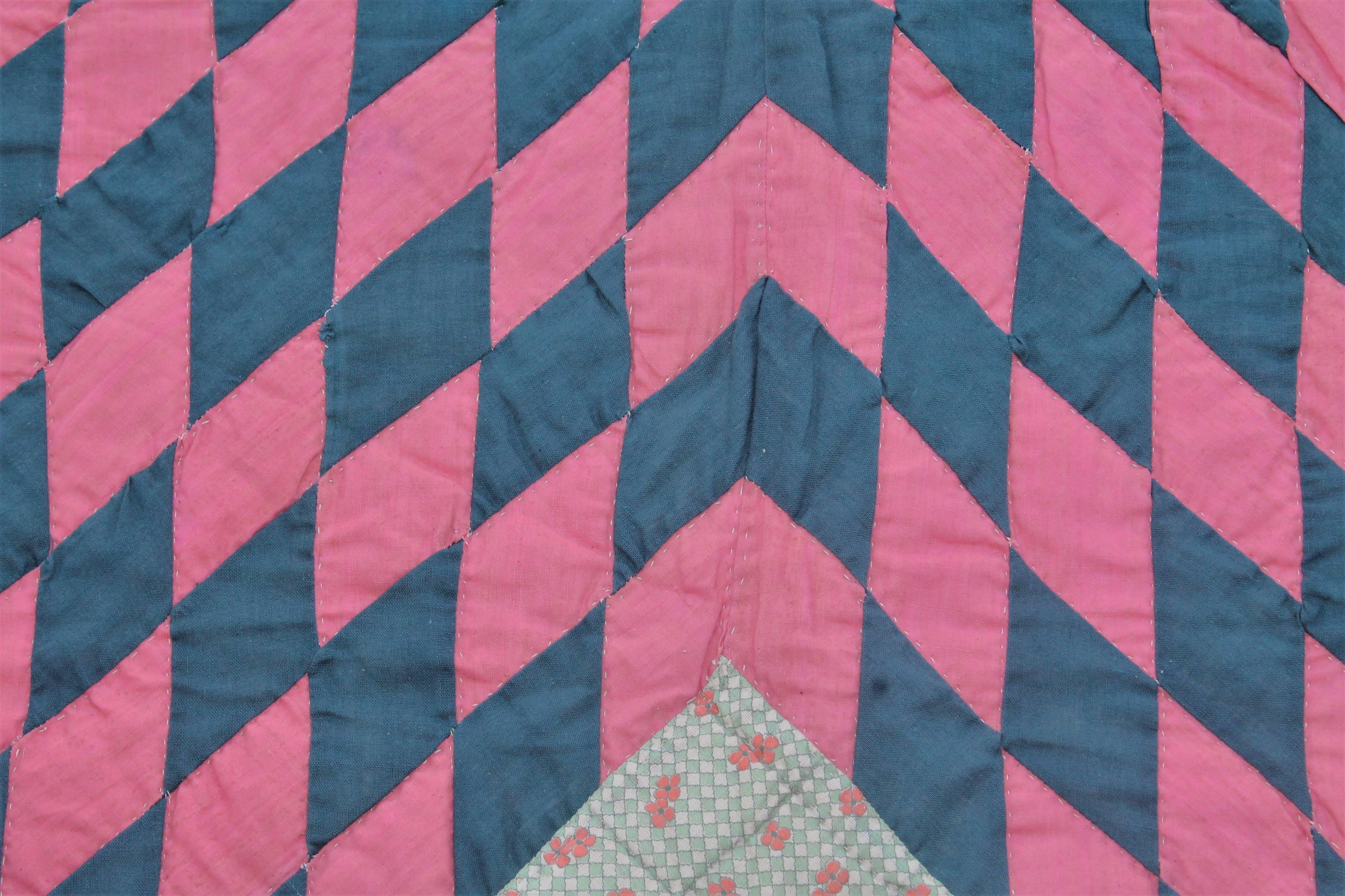This fine example star quilt from Pennsylvania has a teal green back round and very fine tight quilting. The condition is pristine.The calico ground is mint. This quilt is from Lancaster County, Pennsylvania.