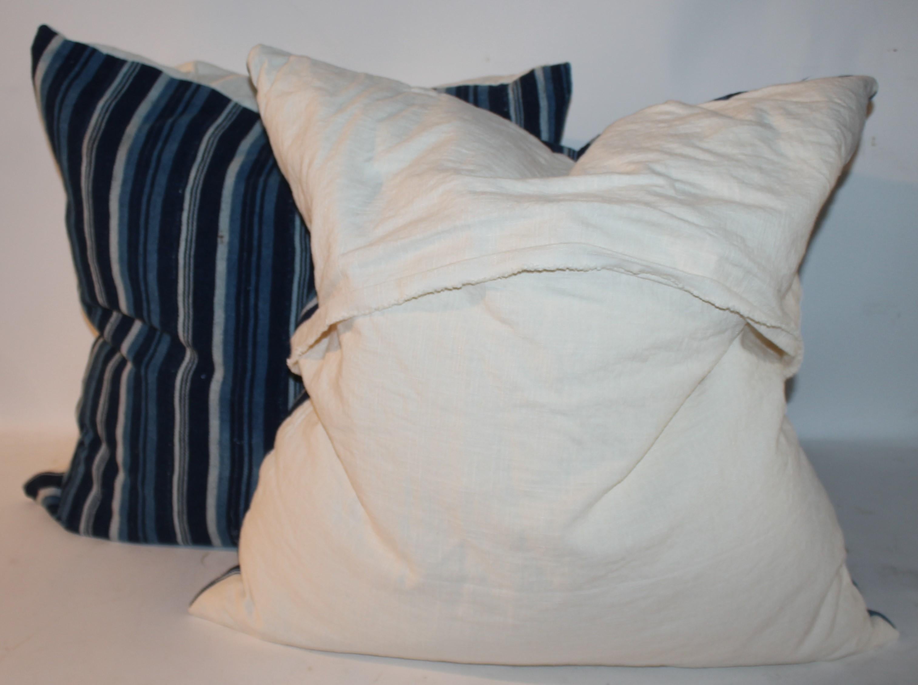 blue and white striped pillows