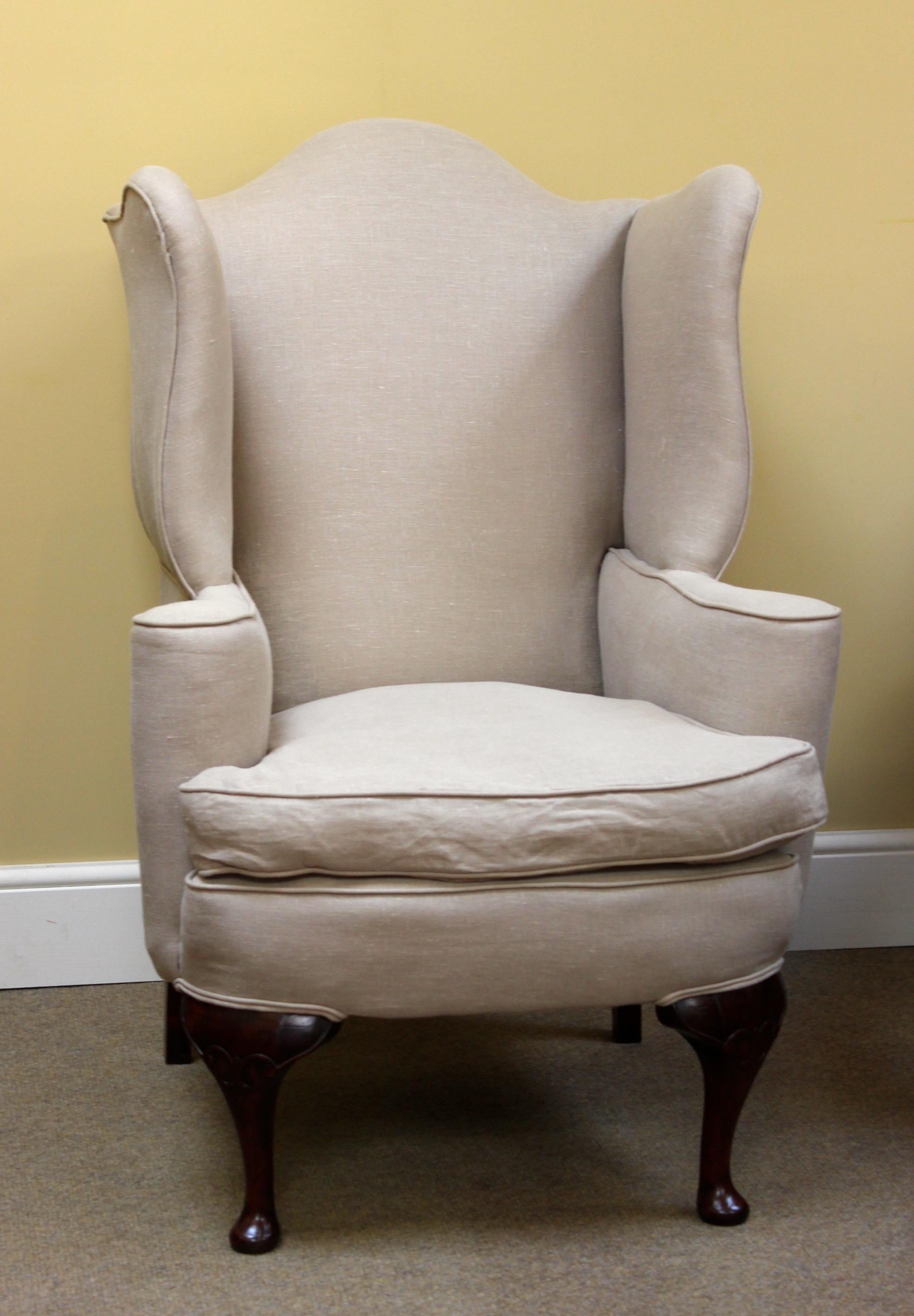 5921
19thc. Walnut Upholstered Wing Armchair
With cushion, cabriole legs & delicate 
Carving on pad feet.

31”w x 46”h x 31”d
79cm w x 117cm h x 79cm d

Items can be delivered by independent carrier
