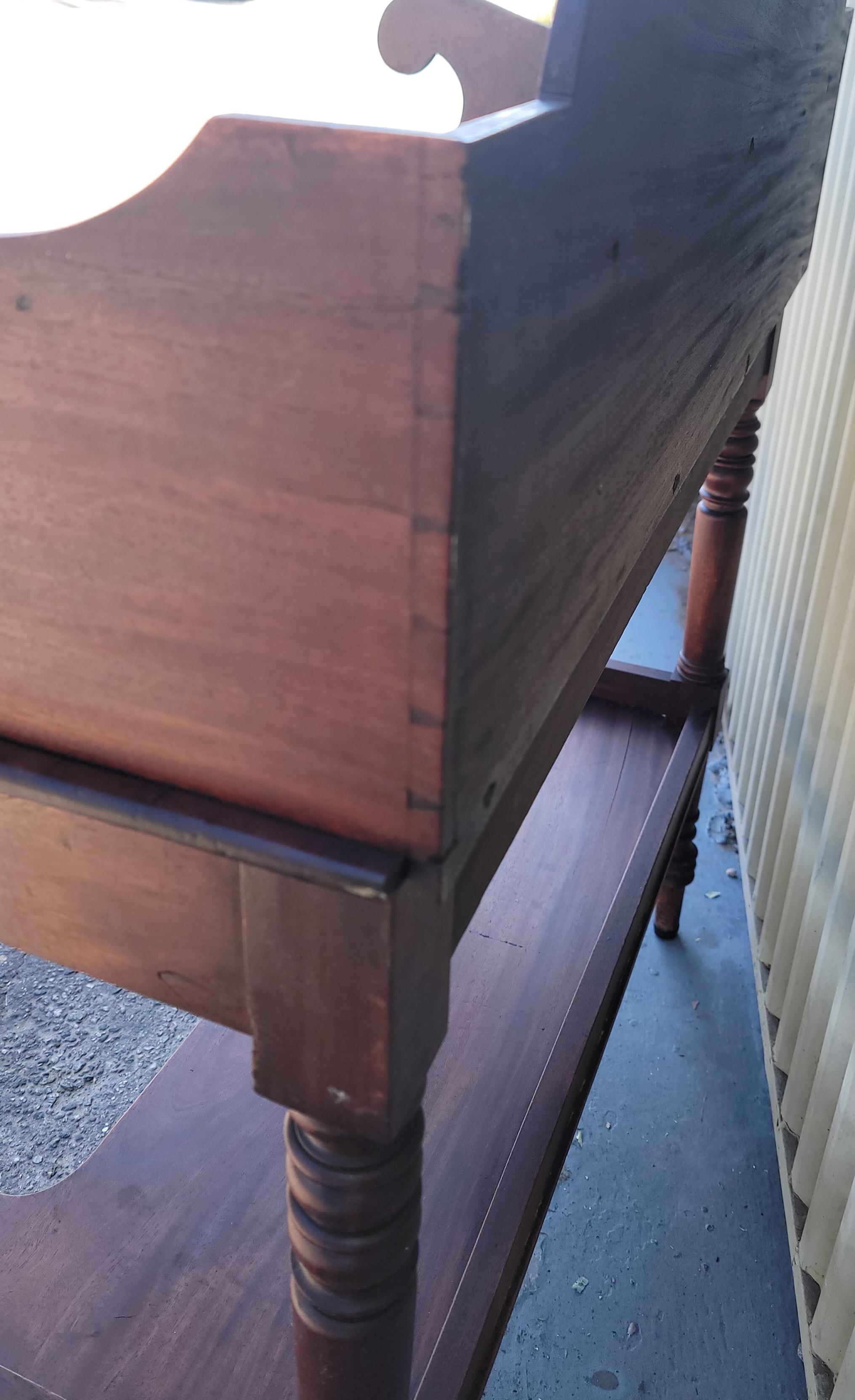 19Thc Tall walnut wash stand on tall legs or vanity. The crown is dovetailed case. The condition is very good and sturdy. The fine hand turned legs are very detailed.