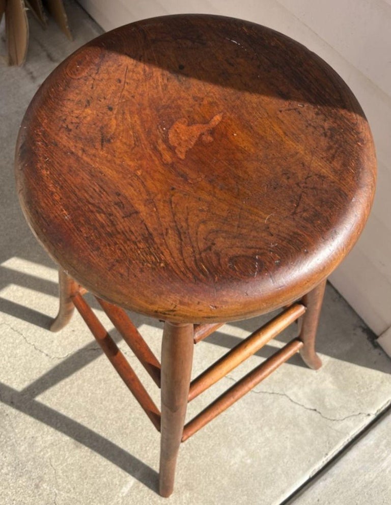 This fine pine hand crafted tall weavers stool is in fine sturdy condition. It has a very nice mellow patina.
Seat measures 12 inches in diameter.