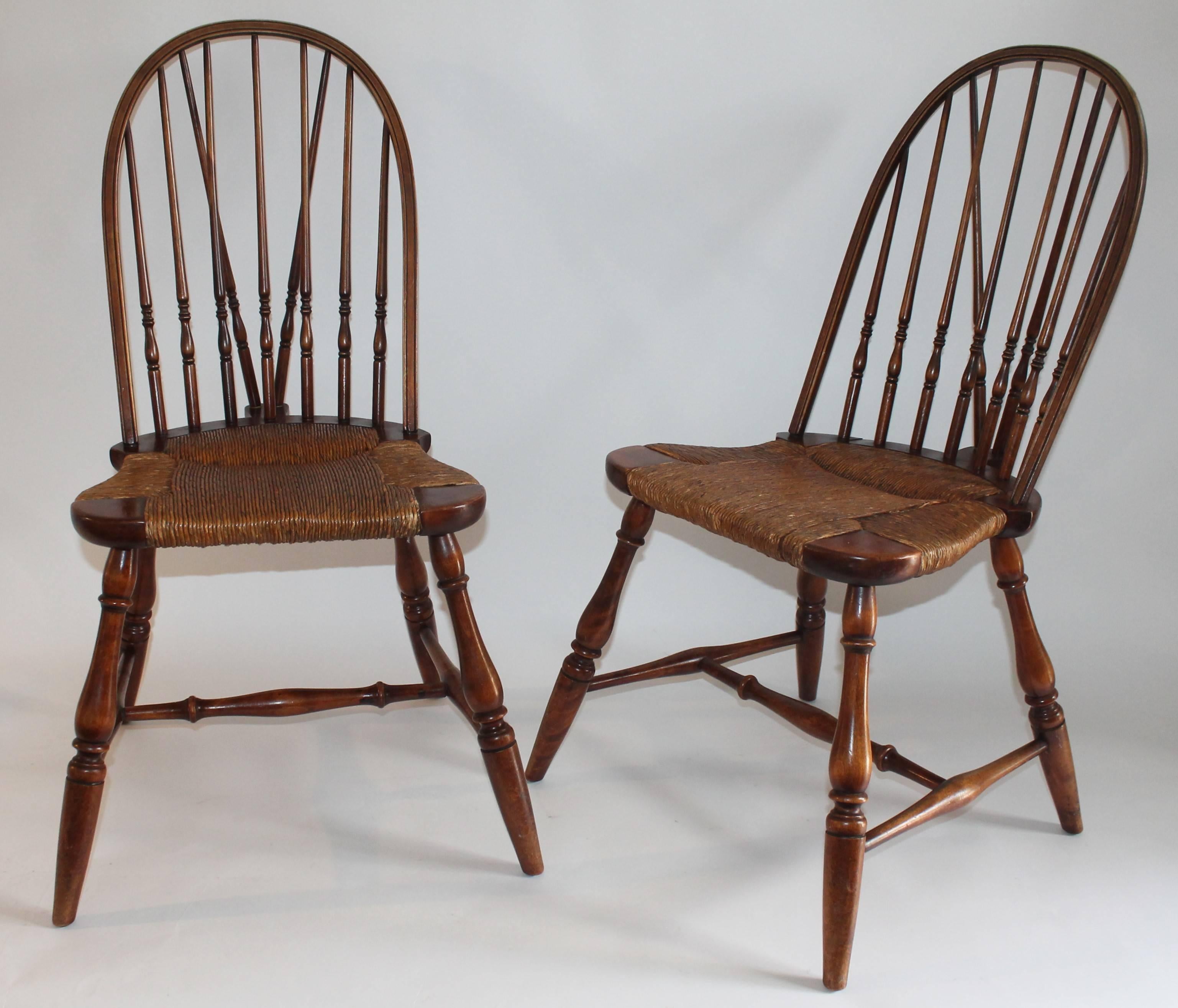 These signed 19th century Davis Furniture Co. chairs are in fine condition with a amazing patina. The seats are all original and hand woven. Sold as a match pair. They are very sturdy and comfortable.