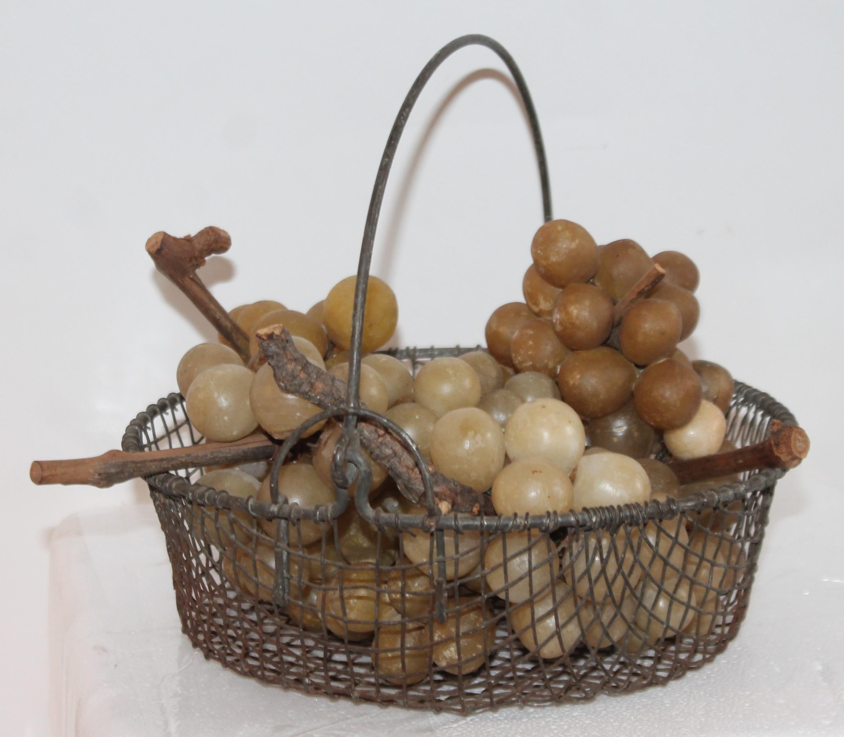 Adirondack 19th Century Wire Basket with Collection of Alabaster Grapes For Sale