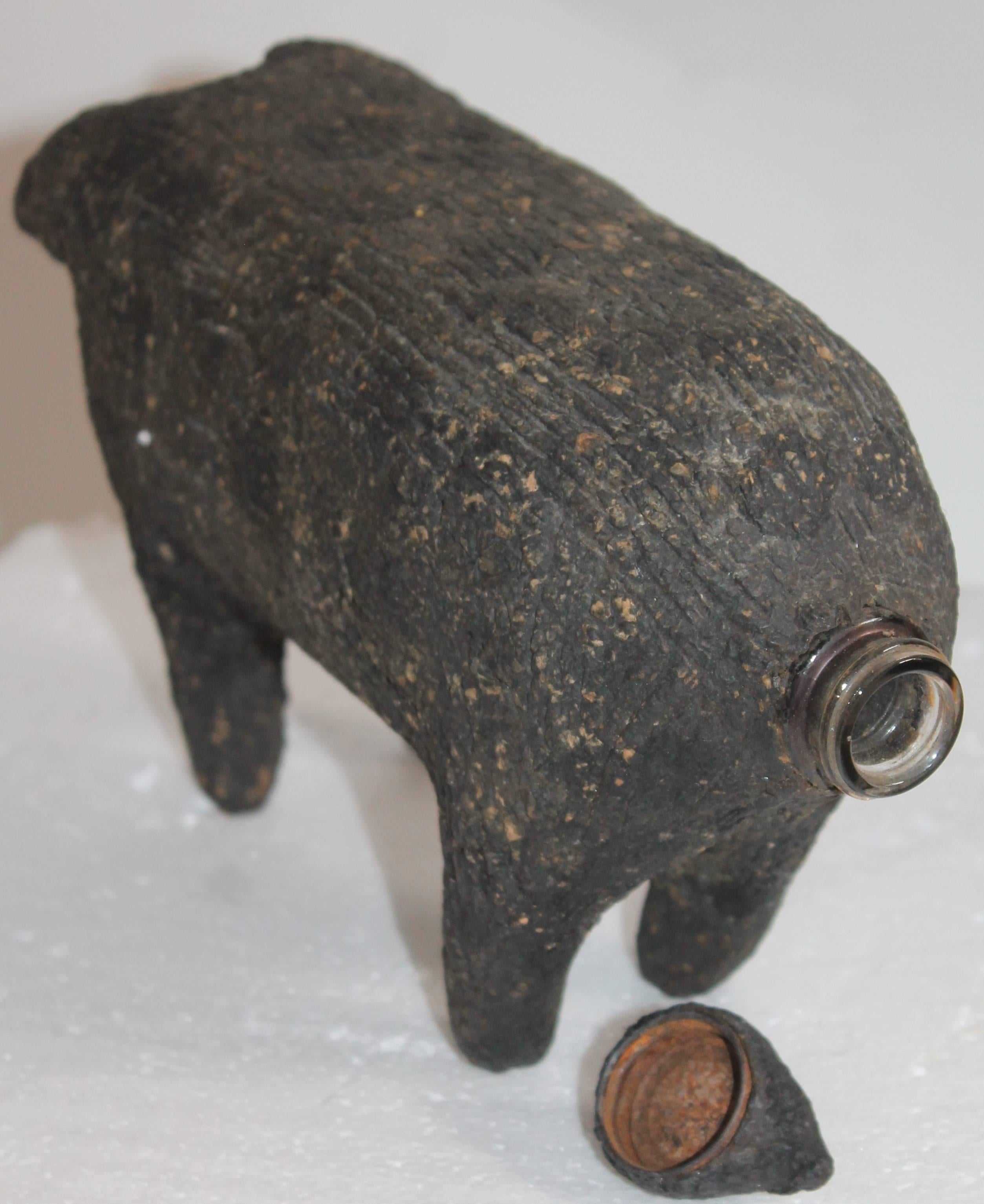 19th century original black painted wood covered handcrafted bottle with a shot glass. This pig is so folky and most unusual. The condition is very good.