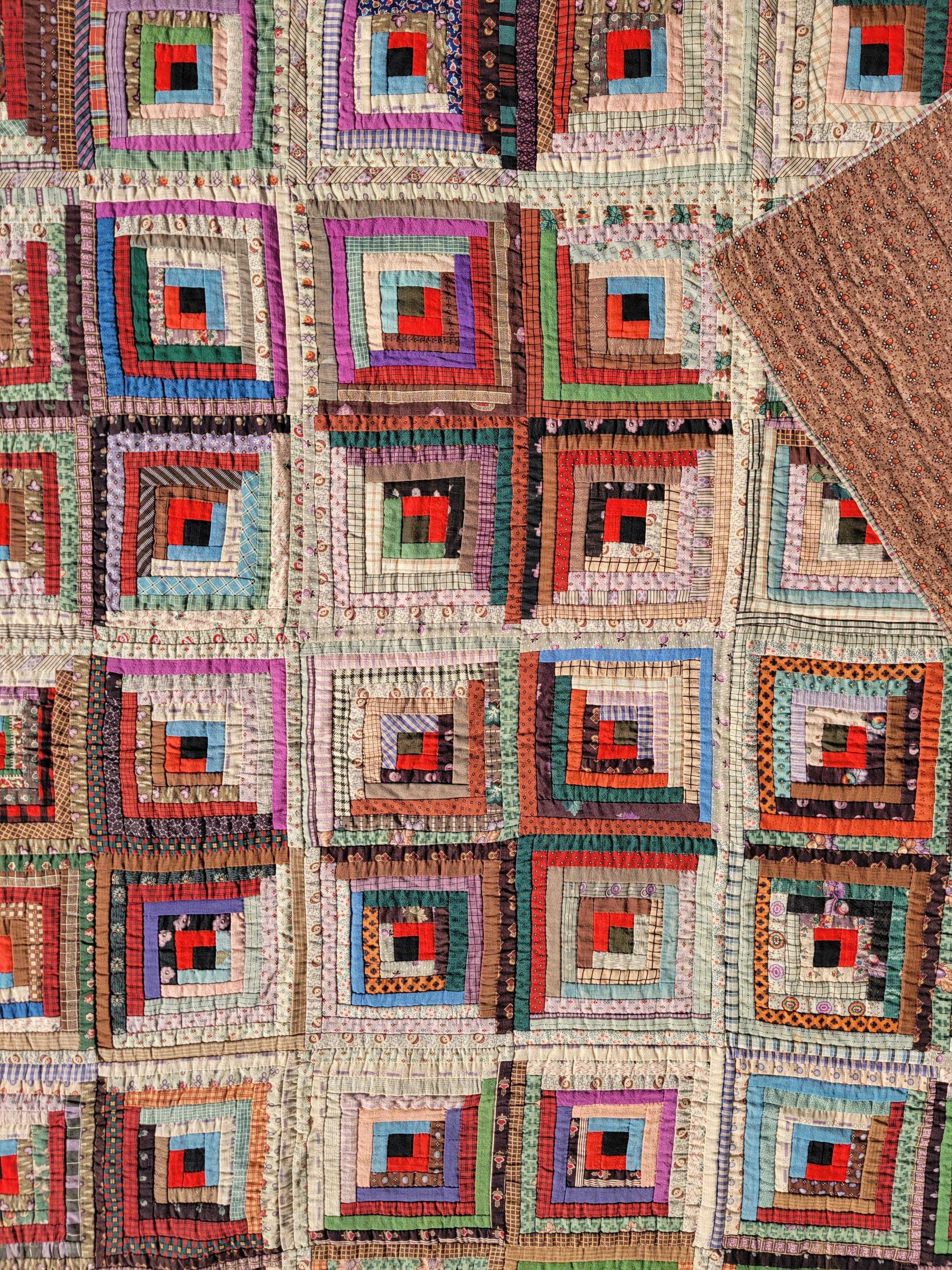 19th C wool log cabin quilt, barn raising pattern. The condition is very good with minor wear on edge.
