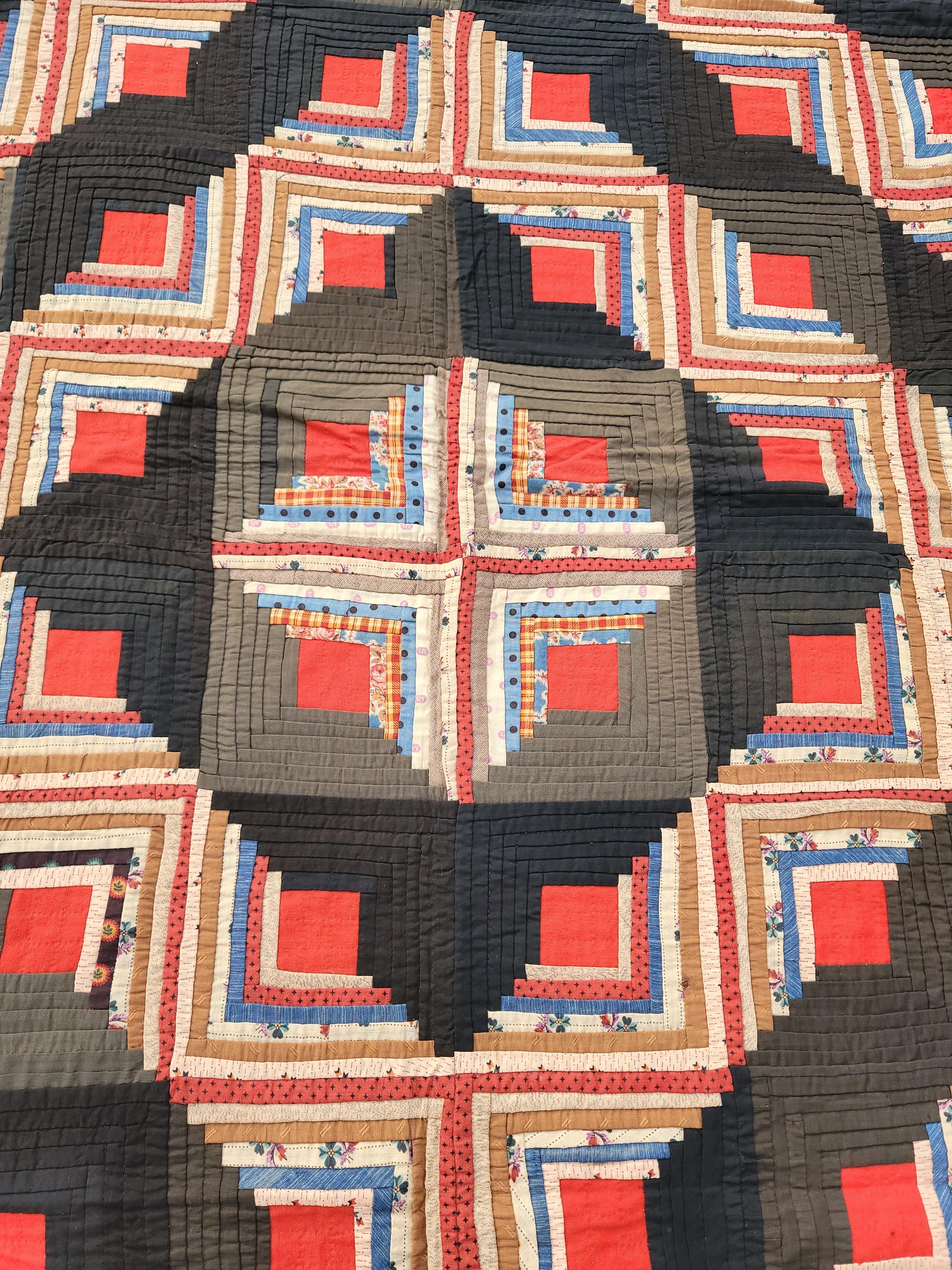 19Thc Wool log cabin quilt or barn raising in fine condition. The backing is in a early brown calico fabric.This was found in Lancaster County,Pennsylvania. The quilt dates from the mid 19thc ( 1860-1870).
This is a real collectors quilt and quite