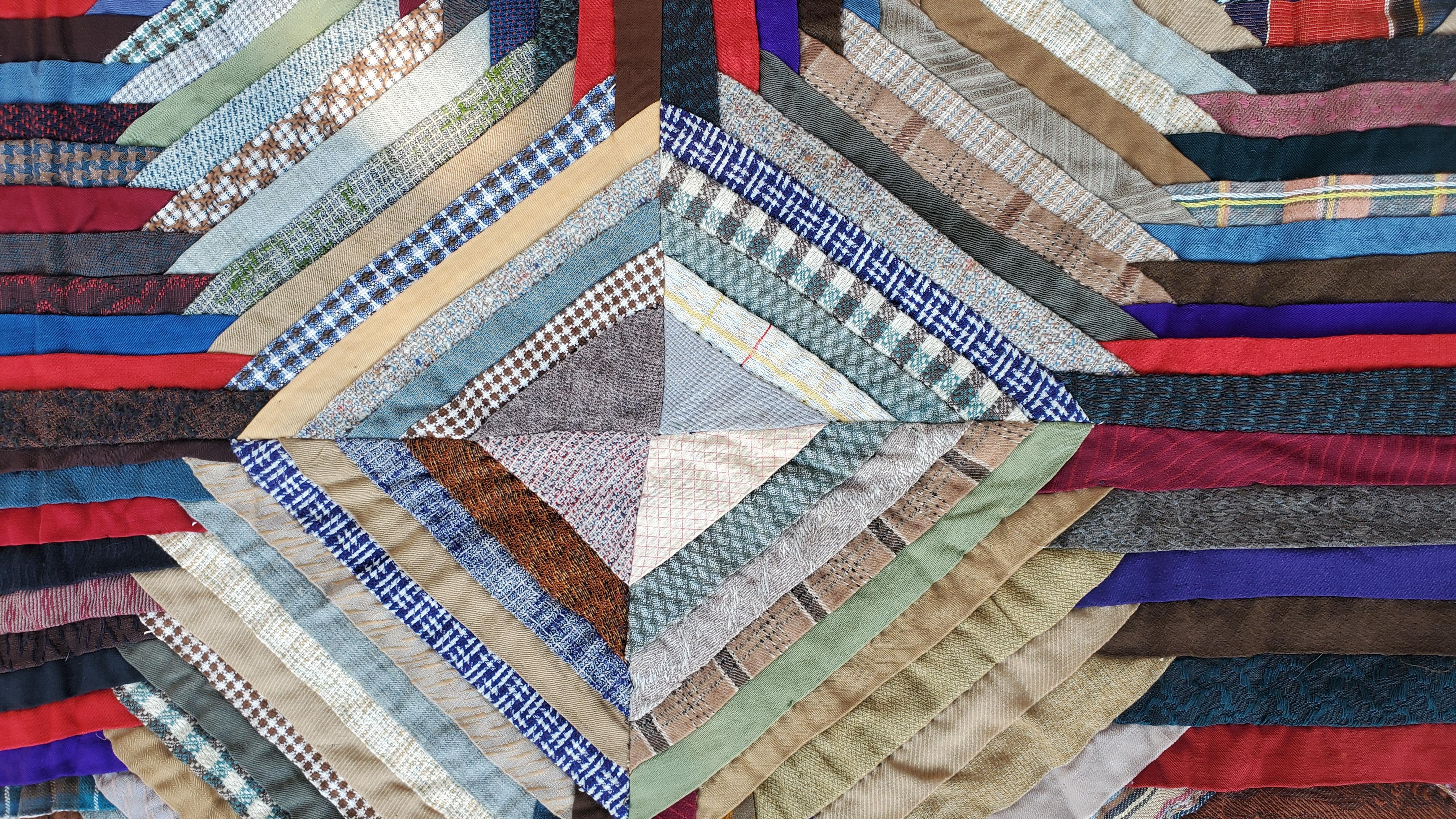 This 19thc wool wind mill blades / log cabin quilt was found in Pennsylvania The quilt is in very good condition. The backing is very good as well. Very unusual with the striped border.