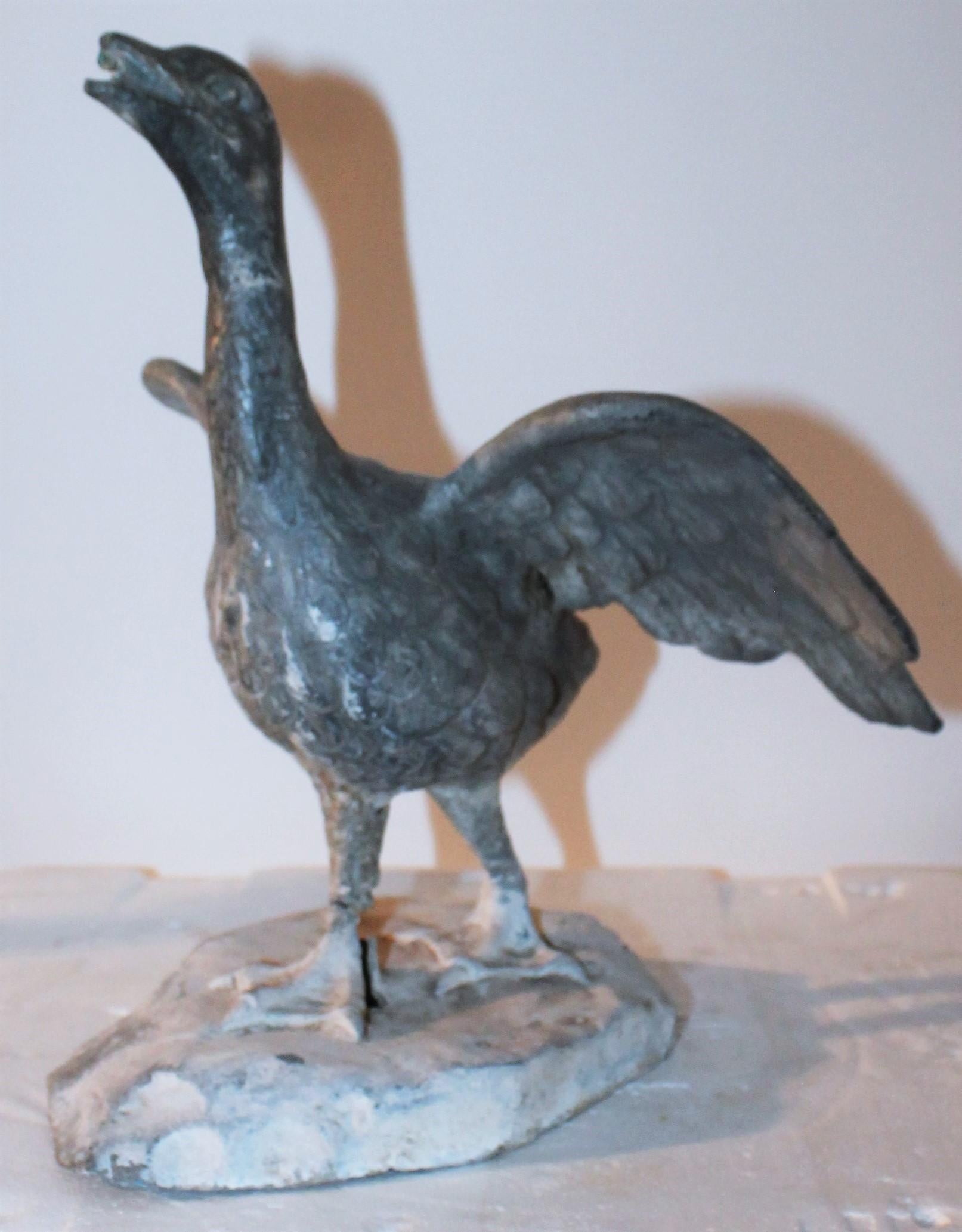 19th century Zinc Folk Art baby goose statue from a old fountain. The condition is good with some age wear.