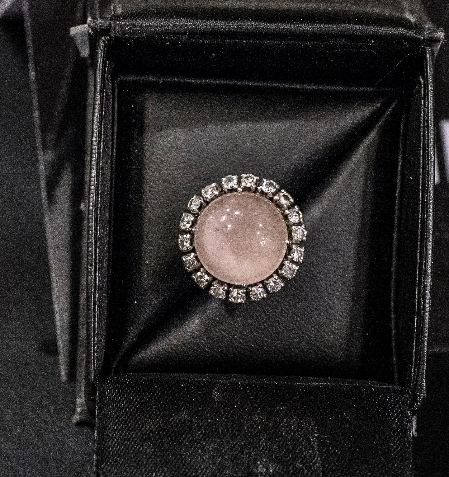 One of a kind 19th century French gold ring with a central pink quartz and diamonds border brilliant cut and antique engarze.
It has been purchased in a French inheritance.
Beautiful and unique.