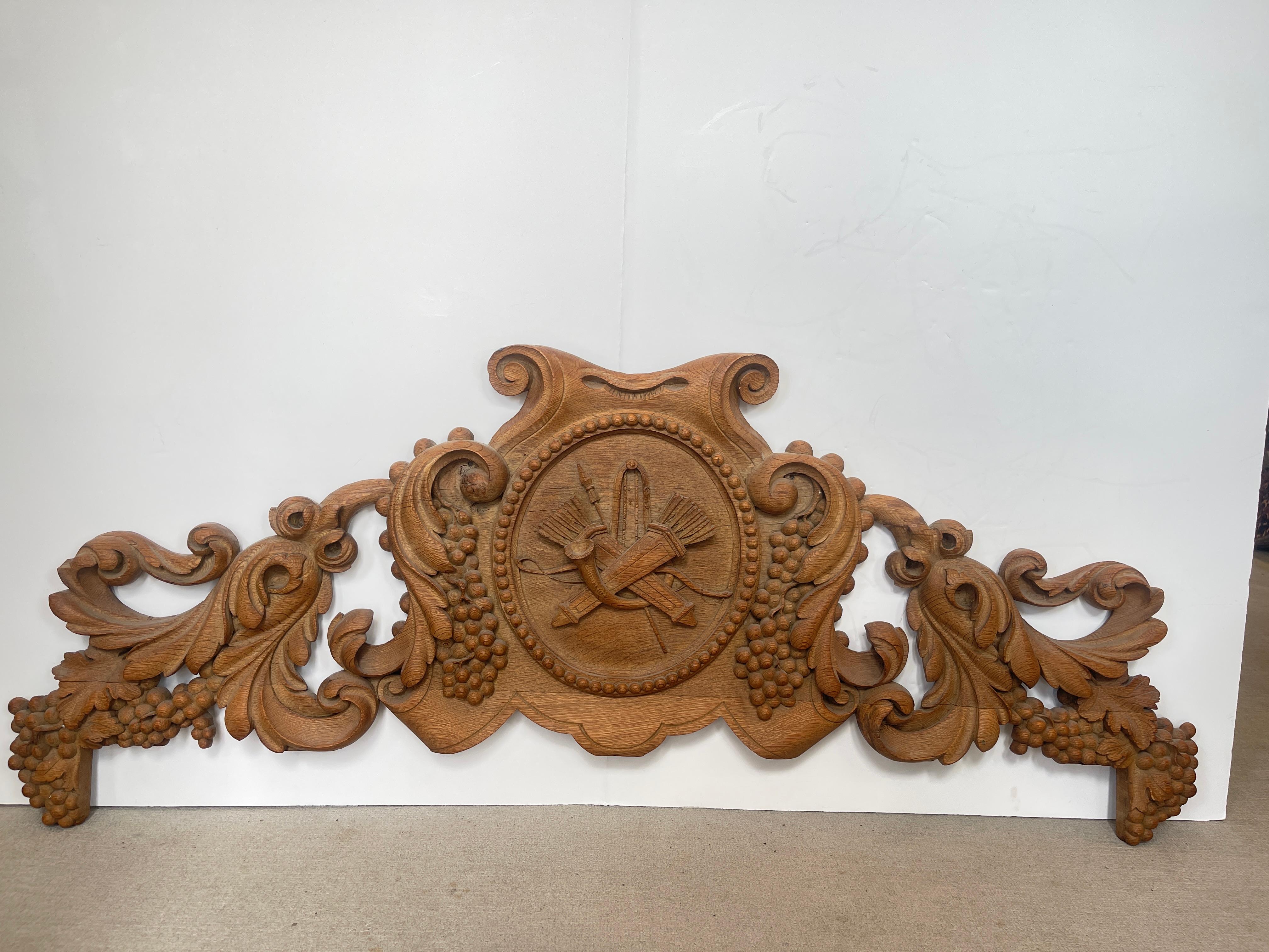 Just arrived in my last container this exceptional 19Th.Century French Solid Oak Hand Carved Over-Door Panel.
The center cartouche is surrounded by scrolls and the center medallion has hunting elements, quivers with arrows a bow and a lance.Please