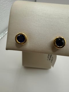 1ct Black diamond studs in a chuinky bezel setting style with screw back design