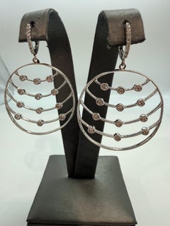 1ct Crazy circle diamond earrings 18KT gold