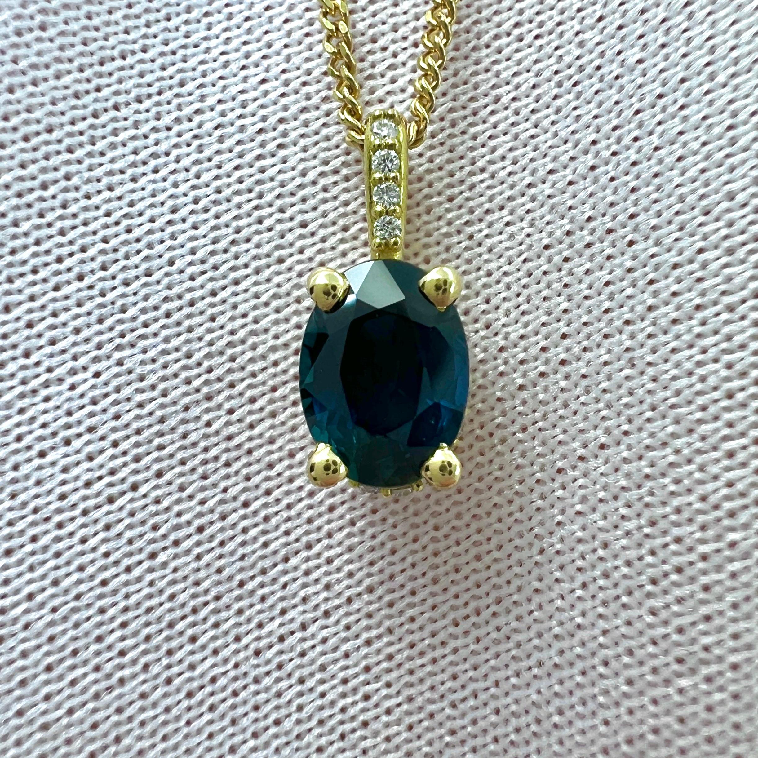 Natural Deep Blue Sapphire & Diamond 18k Yellow Gold Pendant Necklace.

1.00 Carat sapphire with a deep blue colour and excellent clarity. A very clean stone, VVS. Also has an excellent oval cut. Measures 7x5mm.

The sapphire is set in a stunning