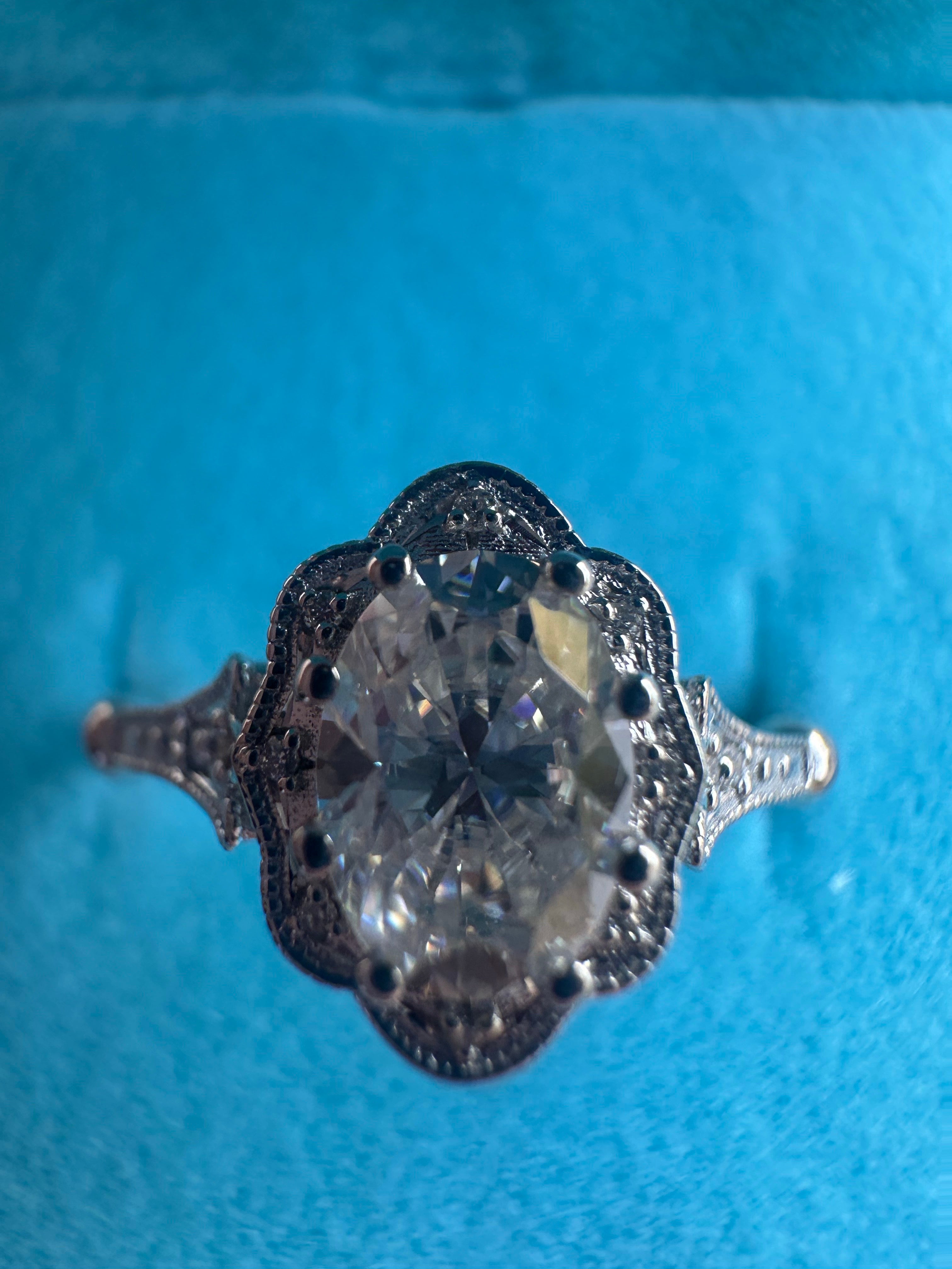 One of a kind Victorian style ring with hand engraving elements, VS diamonds and platinum. Stunning sparkle and craftsmanship!
Oval center:1ct natural diamond
Clarity: VS
Color: F
Cut:EX
Side diamonds