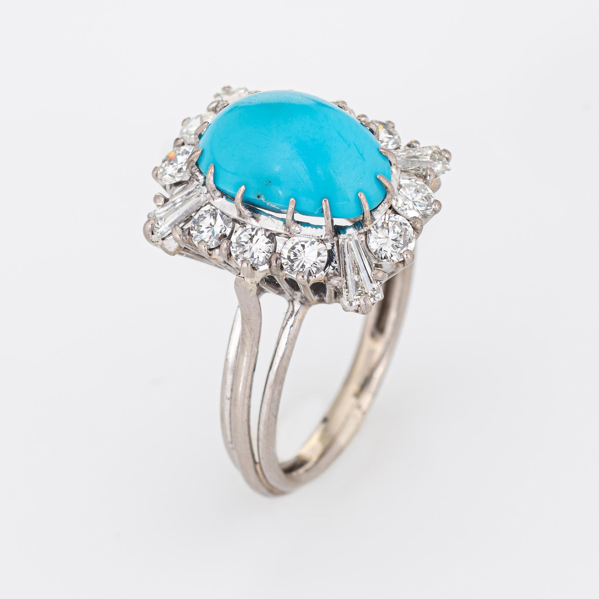 Stylish vintage turquoise & diamond cocktail ring (circa 1950s to 1960s) crafted in 18 karat white gold. 

Cabochon turquoise measures 11mm x 8mm (estimated at 5 carats), accented with an estimated 1 carat of mixed cut diamonds (round brilliant and