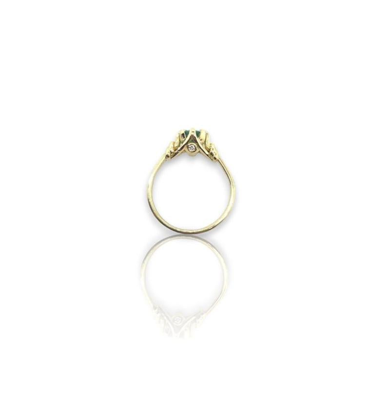 Contemporary 1ct Emerald and Diamond Reef Knot Ring in 18ct Yellow Gold For Sale