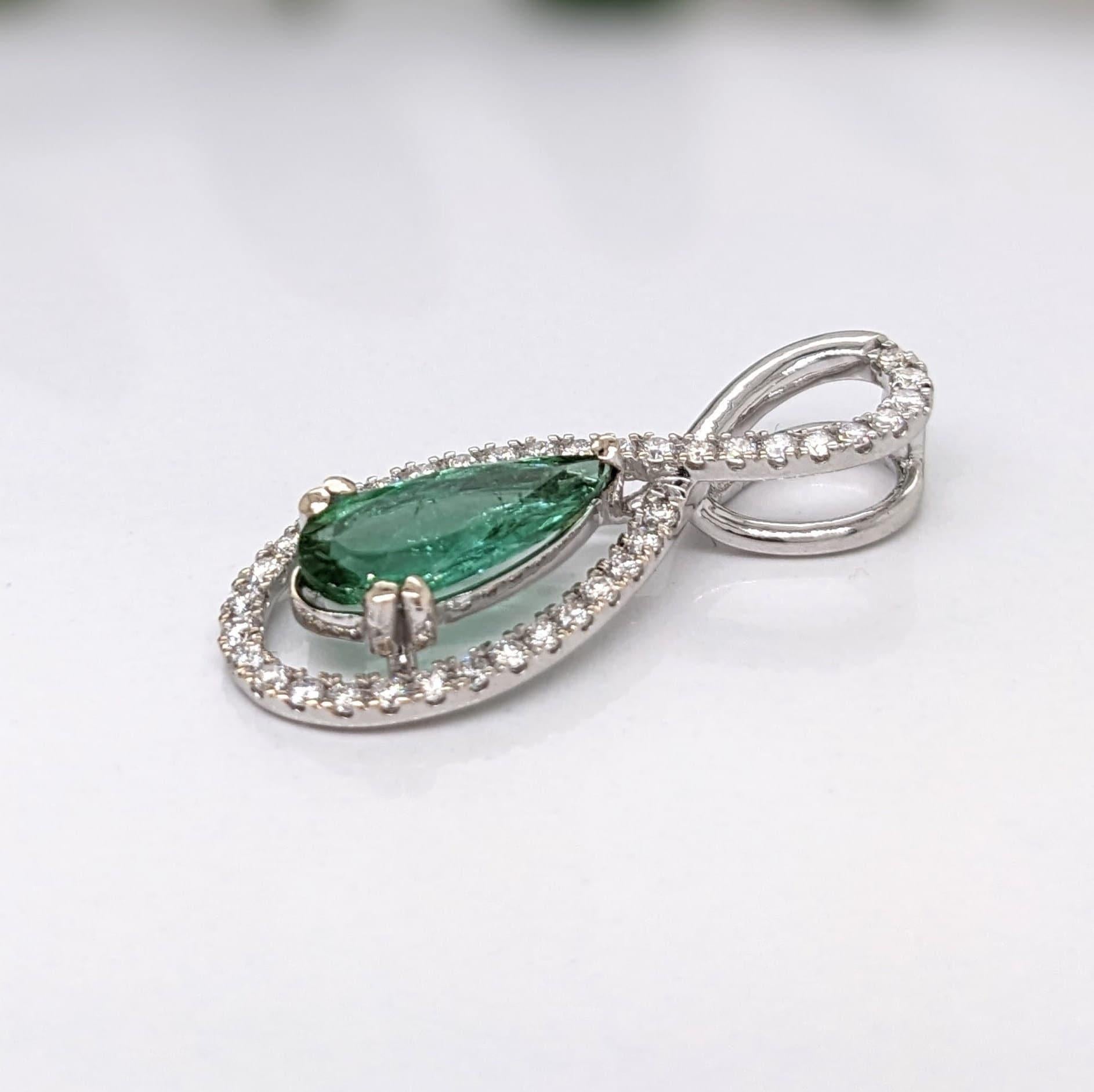 Stunning green tourmaline Pendant in 14K white gold set with a beautiful diamond halo. Perfect for May birthstone and any special occasion! 

Specifications

Item Type: Pendant 
Center Stone: Tourmaline
Treatment: Heated
Weight: 1.09ct 
Head size: