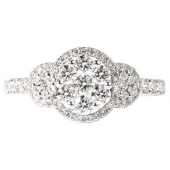 Anillo de compromiso con halo de diamantes redondos naturales de 1 ct con engaste ilusión en oro de 18 quilates