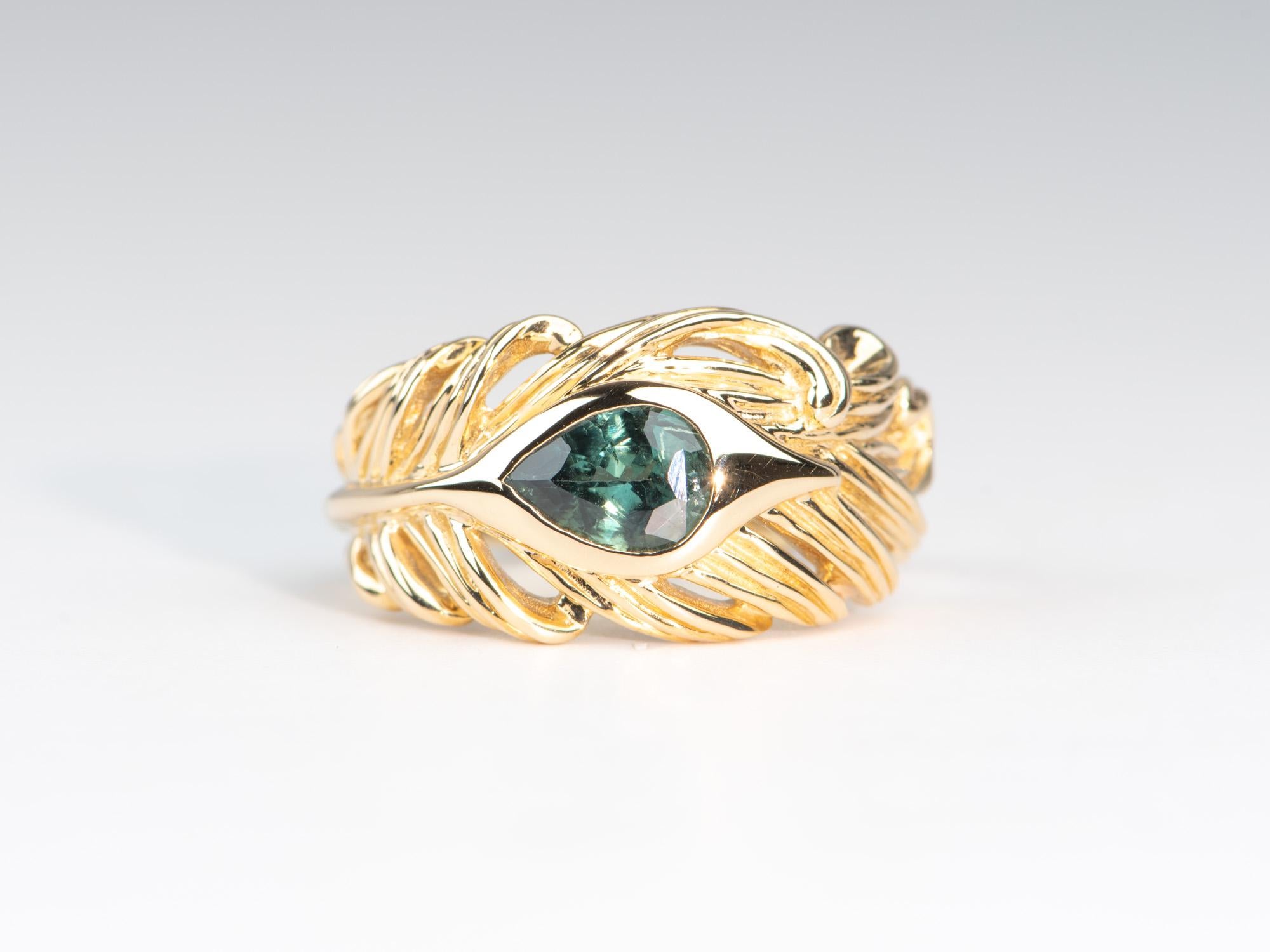 ♥ This is a beautiful peacock feather ring made from an artfully hand-carved wax model, set with a stunning peacock green sapphire
♥ Truly a one-of-a-kind ring for that unique person in yourself!
♥ The item measures 12mm in width at the widest part,