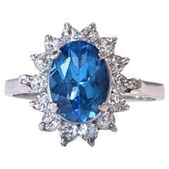 1ct Oval Natural Blue Topaz Platinum Silver Ring