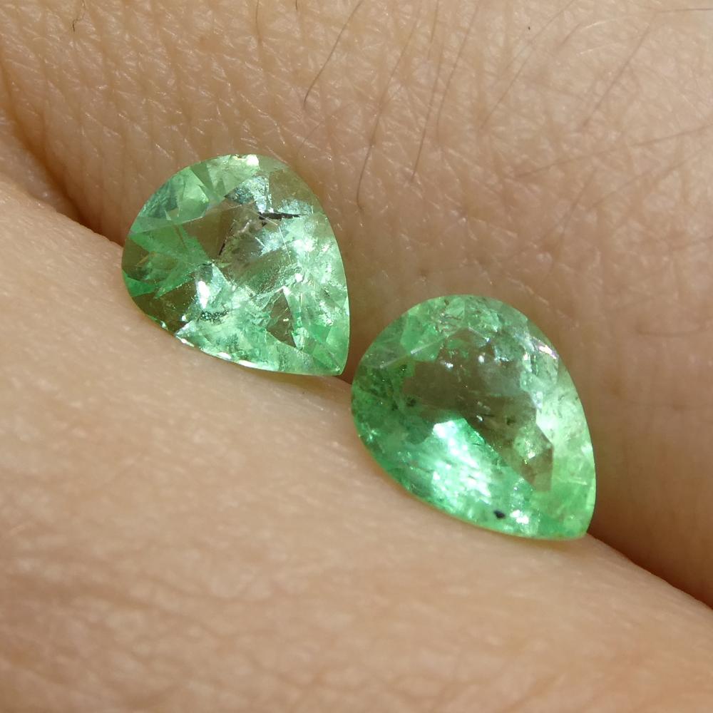 Description:

Gem Type: Emerald 
Number of Stones: 2
Weight: 1 cts
Measurements: 6.33 x 5.03 x 3.27 mm and 6.67 x 4.99 x 2.94 mm
Shape: Pear
Cutting Style Crown: Brilliant Cut
Cutting Style Pavilion: Modified Brilliant Cut 
Transparency: