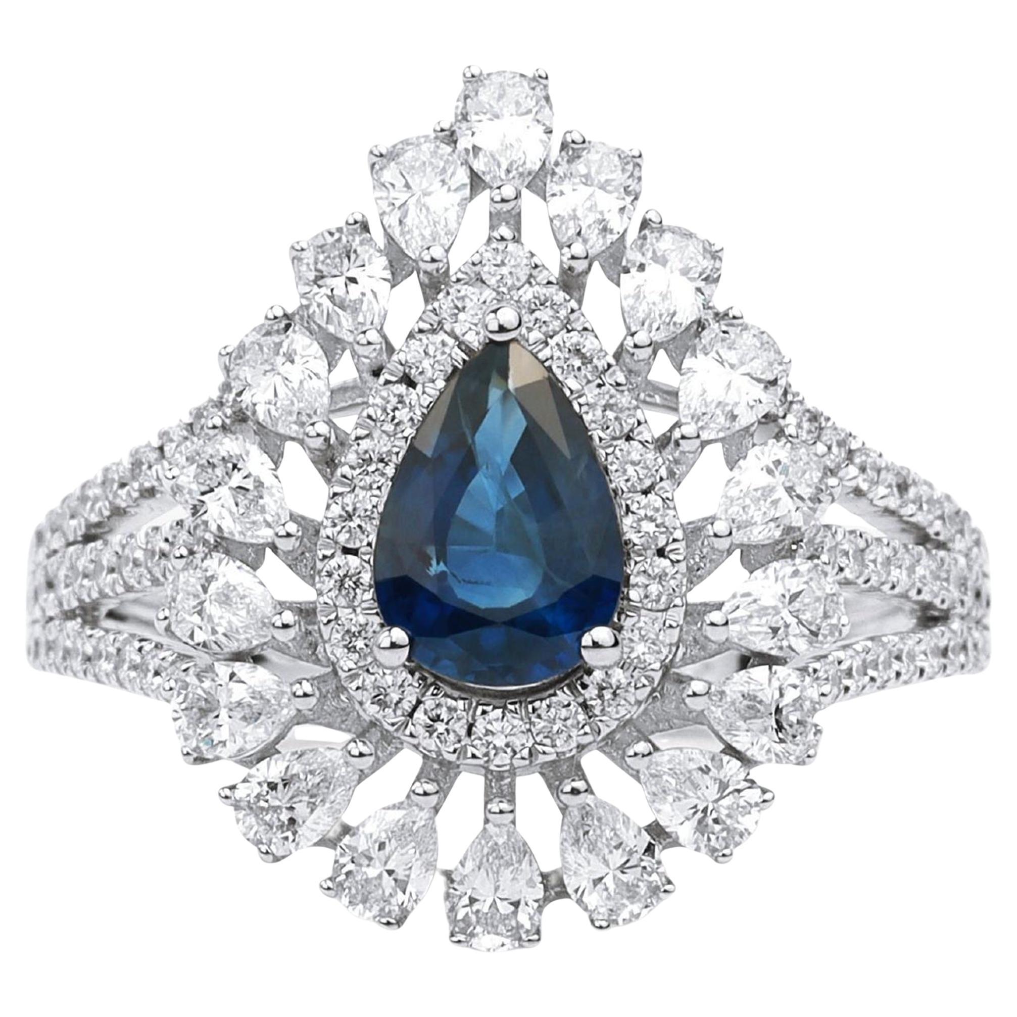 Bague de fiançailles pour elle : saphir bleu poire, diamant, double halo. en vente