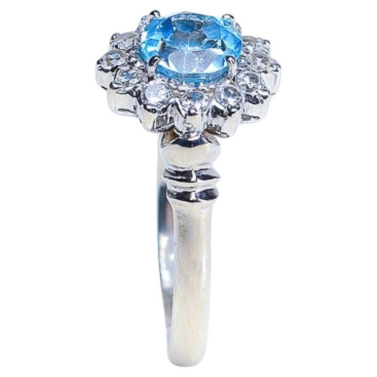 Anillo de plata y platino con topacio azul natural redondo de 1 ct Corte redondo en venta