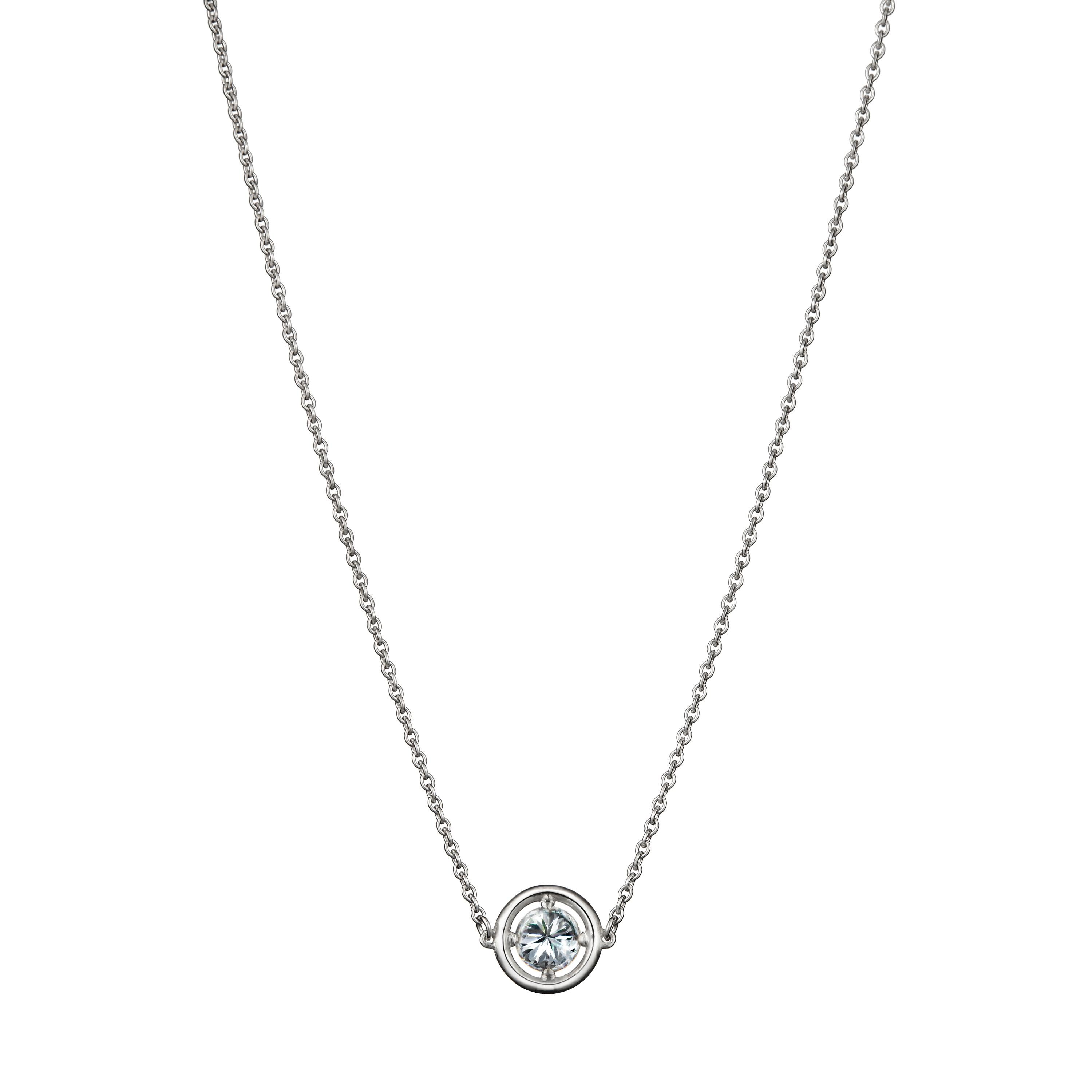The No.1 Solitaire Pendant is designed to maximise the brilliance and luminosity of the diamond. Our distinctive halo is carefully engineered to elevate the diamond, emphasising its size while strengthening and protecting the stone’s integrity. The