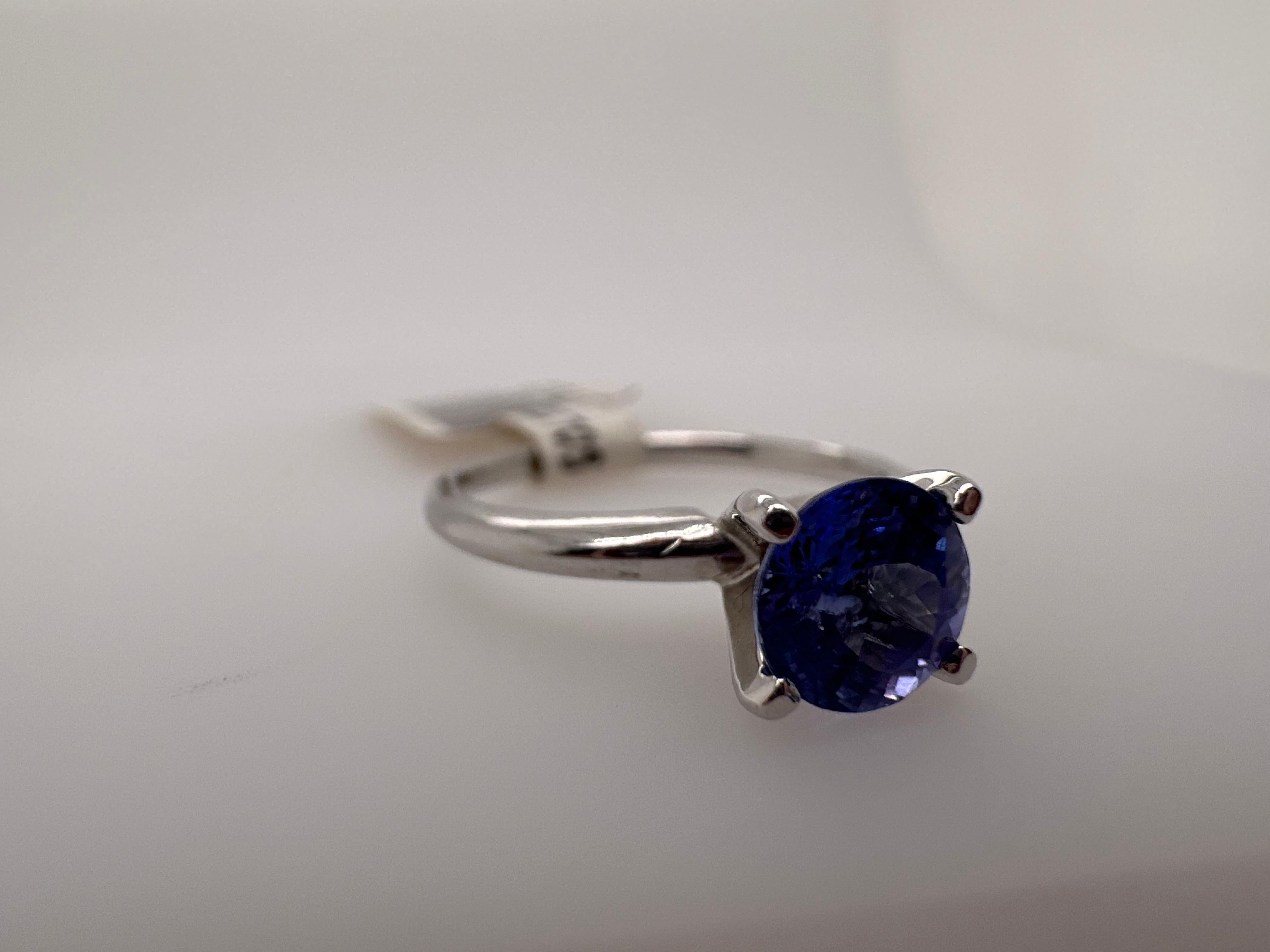 Solitaire ring made with 1ct tanzanite in 14Kt white gold.

Metal Type: 14KT 

Natural Tanzanite(s):
Color: Violet
Cut:Roound
Carat: 1.01ct
Clarity: Moderately Included

Certificate of authenticity comes with purchase

ABOUT US
We are a family-owned