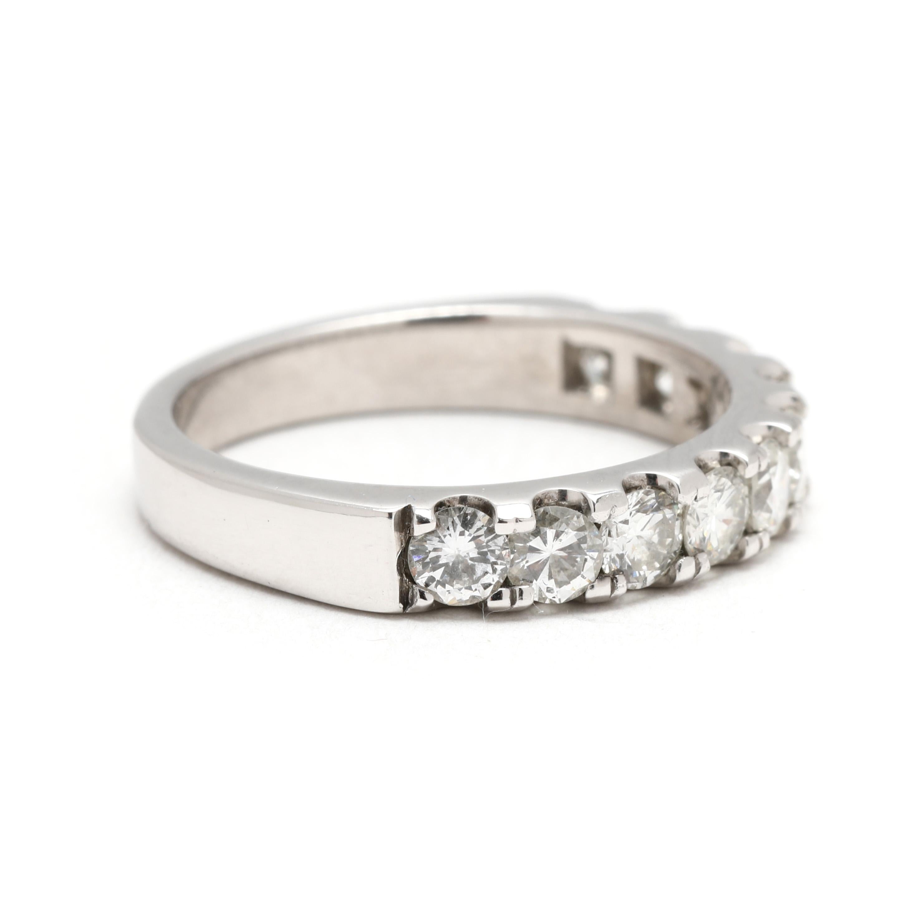Stones:
diamond, 10
round brilliant cut
3 mm
approximately 1 total carat
GH color/ VS2-SI1 clarity

Ring Size 6

Rise Off Of Finger: 2.5 mm

Width: 3.6 mm

Weight: 2.1 dwts/ 3.3 grams

Stamps: 