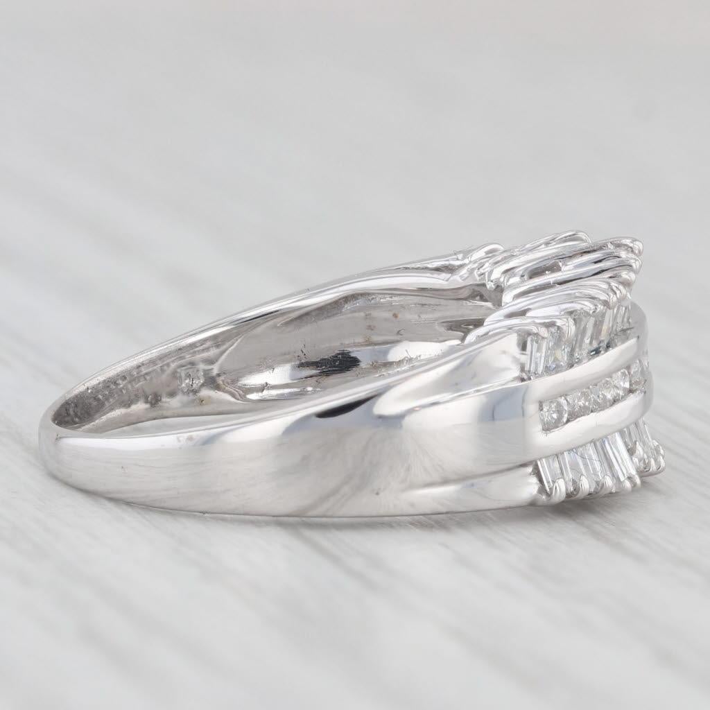 Gemstone Information:
- Natural Diamonds -
Total Carats - 0.20ctw
Cut - Round Brilliant
Color - G - I
Clarity - I1 - I2

- Natural Diamonds -
Total Carats - 0.80ctw
Cut - Baguette
Color - G - H
Clarity - SI2 - I1

Metal: 14k White Gold
Weight: 5.9