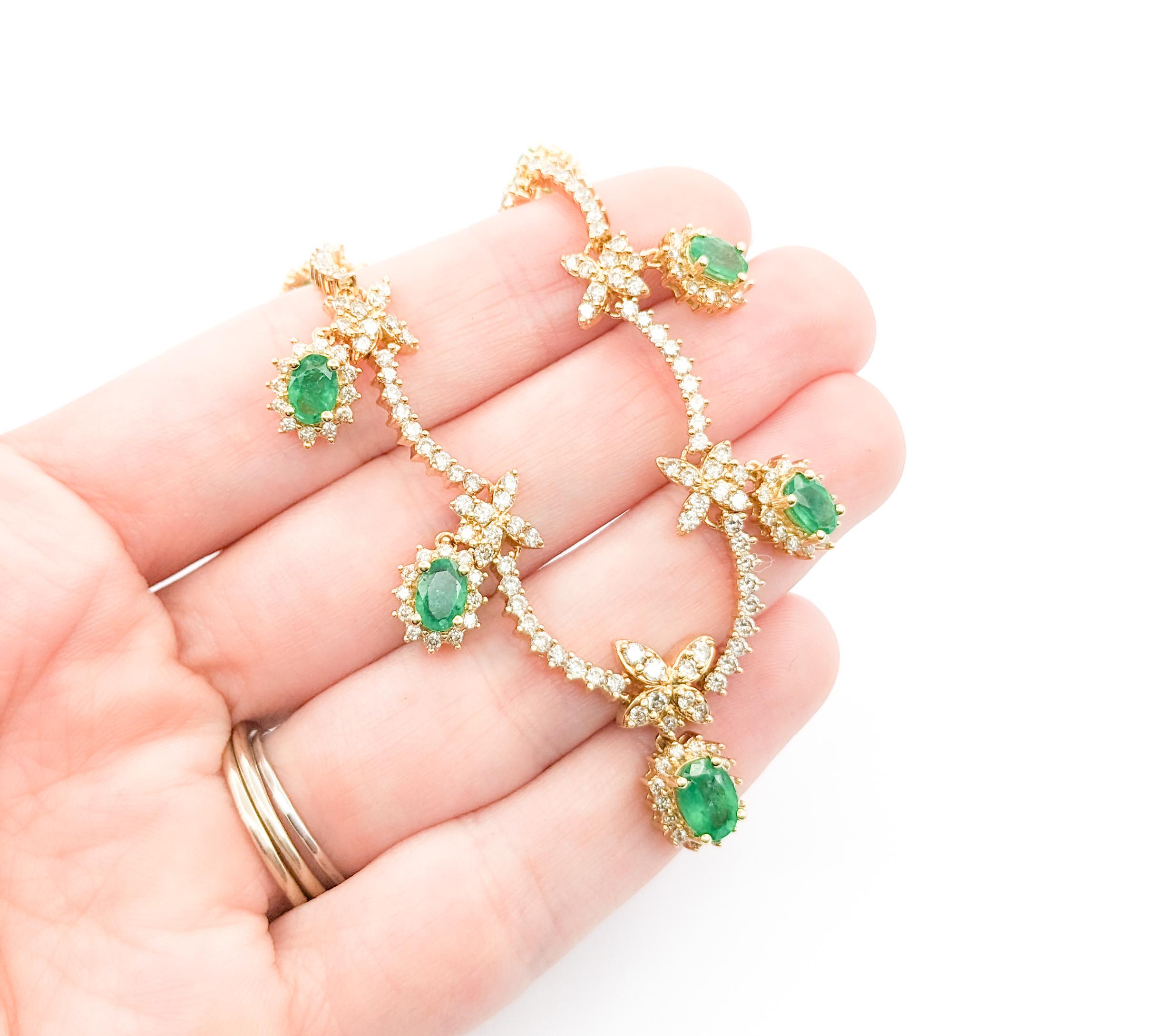 1ctw Emerald And 3.15ctw Diamond Necklace In Yellow Gold

Introducing this beautiful Gemstone Fashion Necklace 7 Station, crafted in 14k yellow gold. The chain features 1.0 ctw of round diamonds with halo emeralds. These sparkly diamonds are I