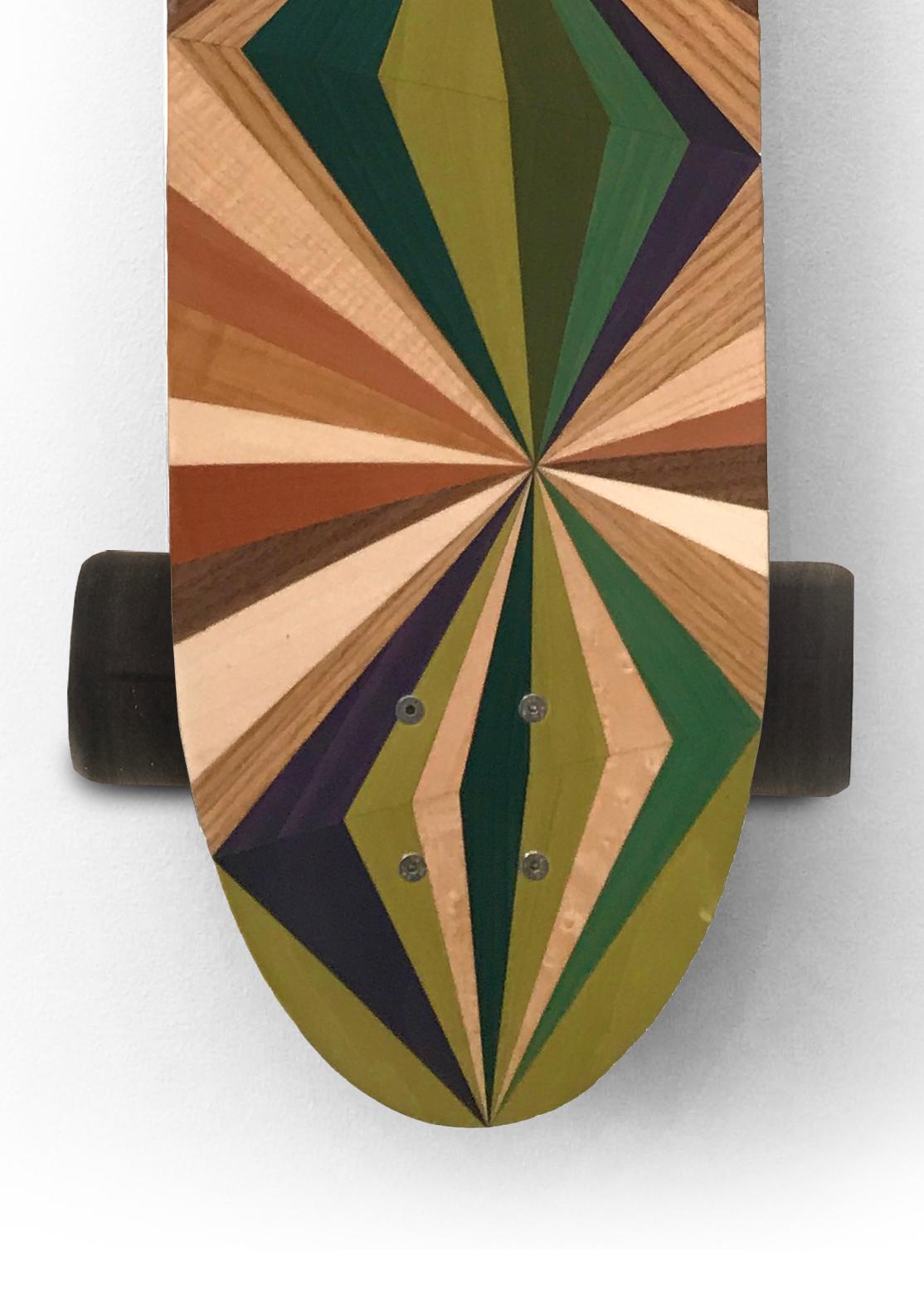 The w o o d p o p pintail longboards are handcrafted in workshops on either side of the Welsh/English border the UK. Each one is made from best quality Finnish Birch and vacuum laminated to form a concave deck featuring a unique marquetry inlay