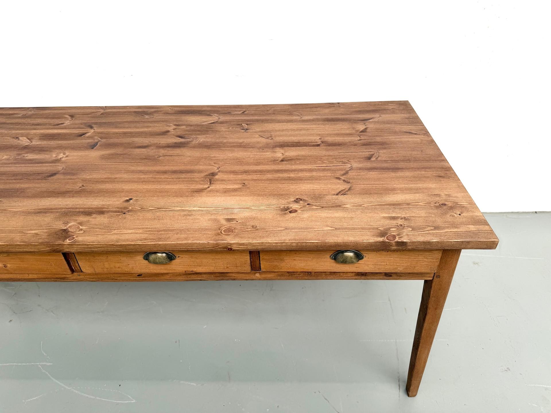 European 1ntique farmhouse table in beech and pine,  with 8 drawers For Sale